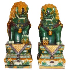 Retro Pair of Green and Gold Chinese Sancai Glazed Foo Dogs