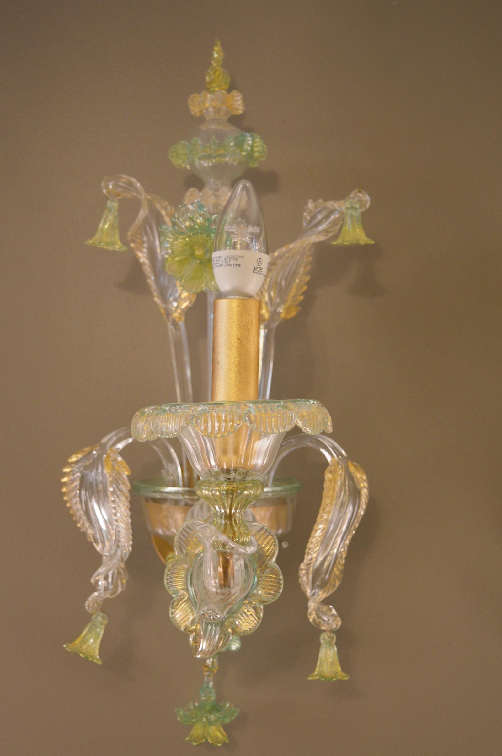 Pair of green Murano sconces with gold flecks.