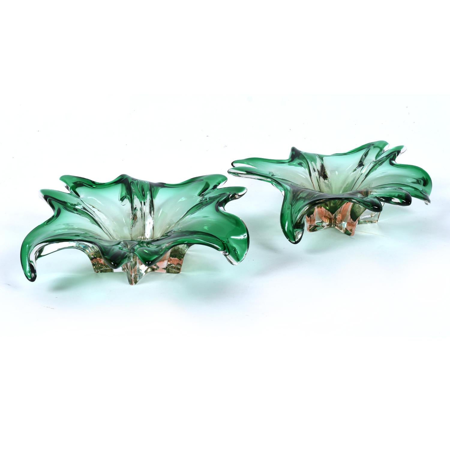 Pair of vintage 1960s emerald green and blush pink Murano glass dishes. The seemingly amorphic shape take on a botanical form. Several 