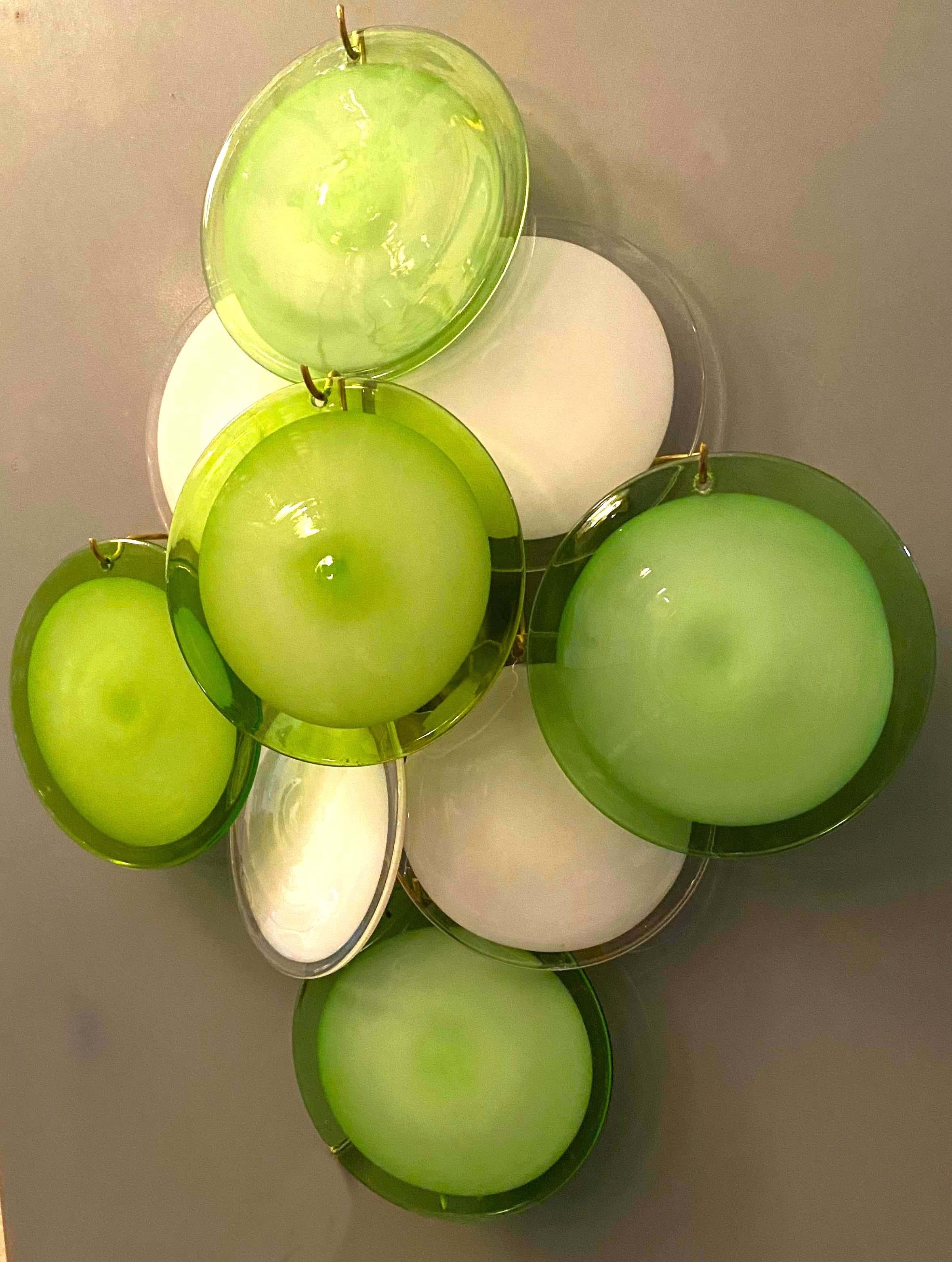 Amazing pair of sconces with nine green and white Vistosi discs Murano.
Available two pairs and also the matching chandelier. Item ref LU98593828532
Two E14 light bulbs.
We can rewire for you country standards.