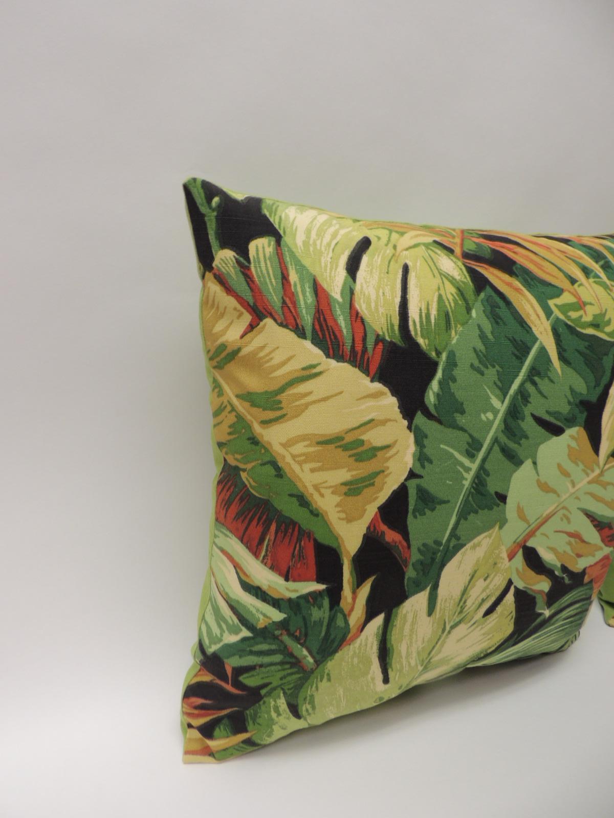 Pair of tropical design printed pillows, in shades of green, orange and black. Acid green backings. Palm beach Boho-chic. Throw pillows handcrafted and designed in the USA. Closure by stitch (no zipper closure) with a custom-made pillow