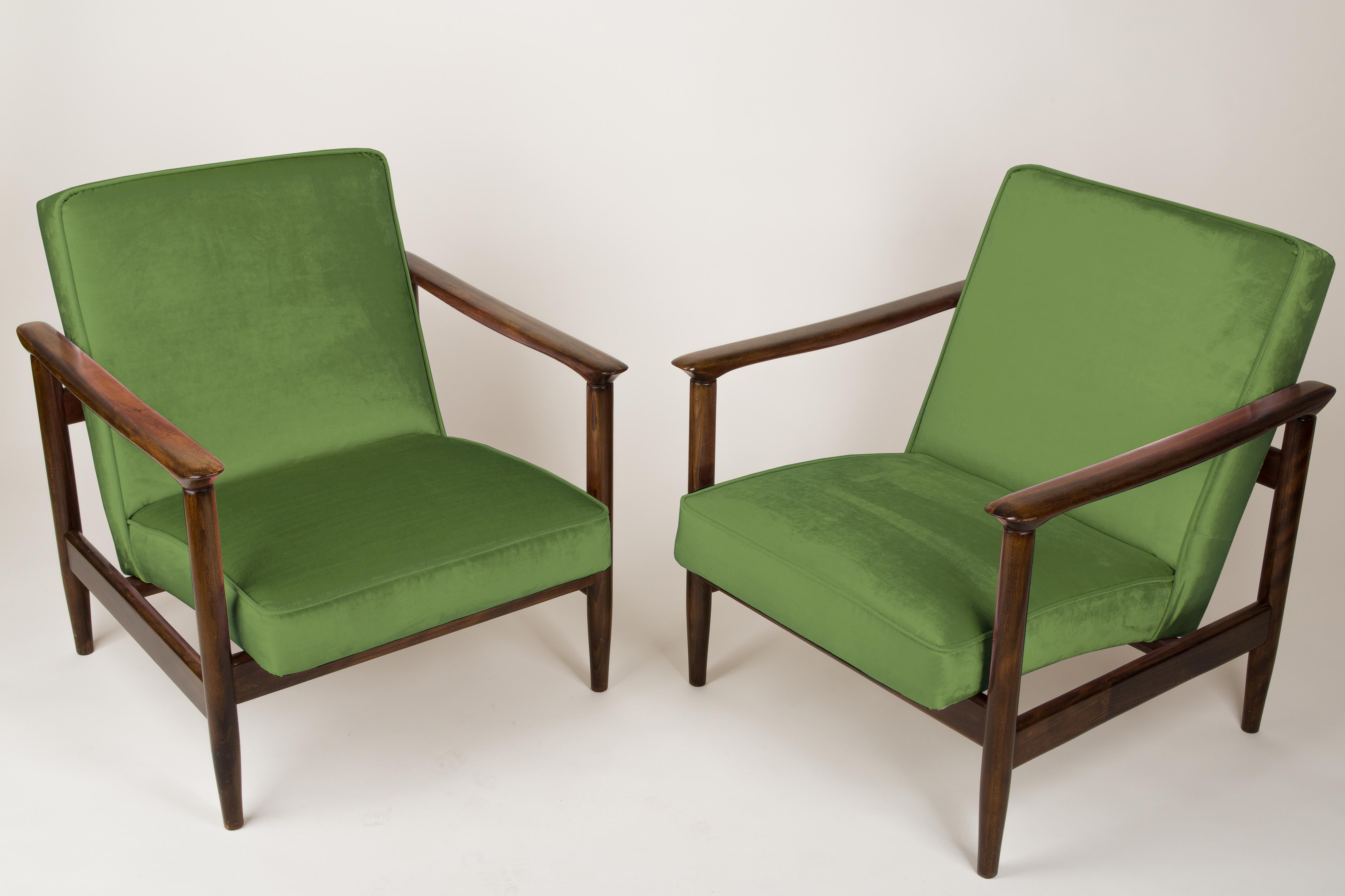 A pair of armchairs GFM-142, designed by Edmund Homa. The armchairs were made in the 1960s in the Gosciecinska Furniture factory. They are made from solid beechwood. The GFM-142 armchair is regarded one of the best polish armchair design from the