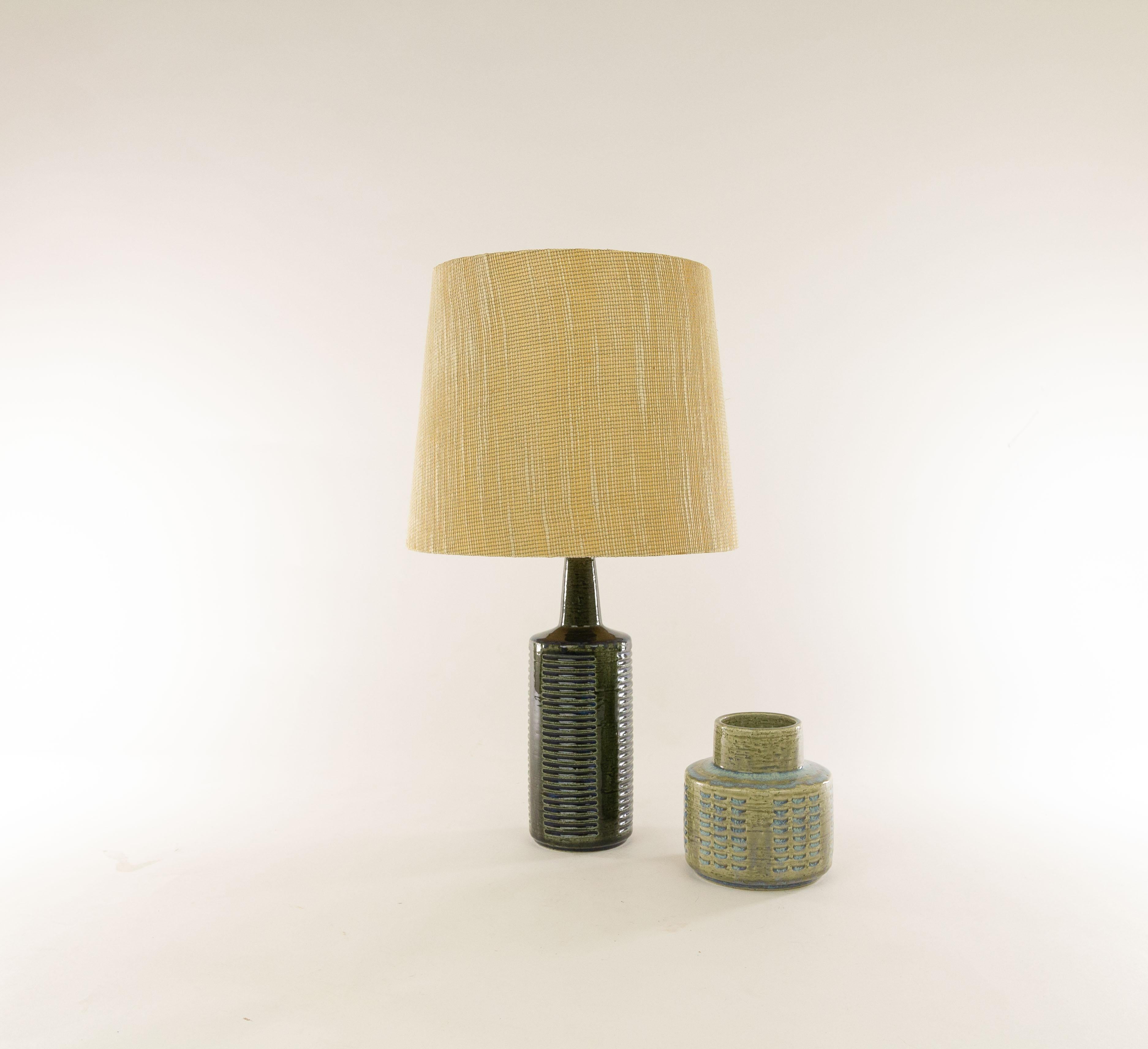 A pair of DL/30 table lamps made by Annelise and Per Linnemann-Schmidt for Palshus in the 1960s. The color of both pieces is Green and Navy Blue.

The lamps come with their original lampshade holders. The lampshades shown are for display purposes
