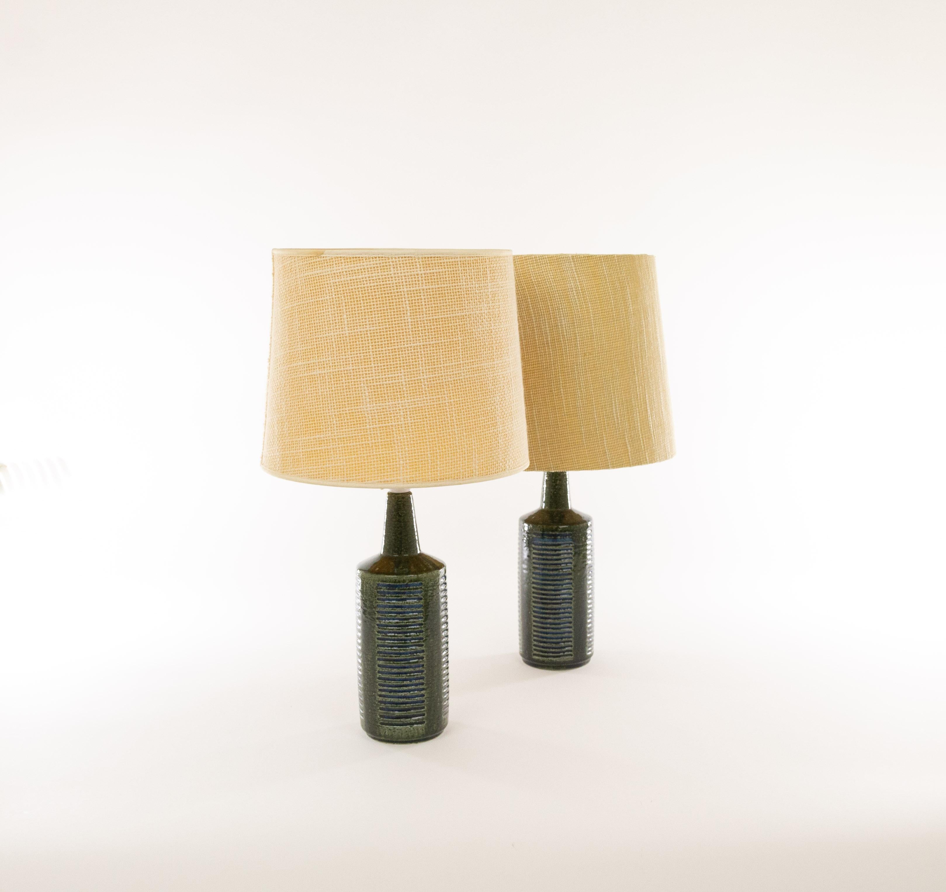 A pair of DL/30 table lamps made by Annelise and Per Linnemann-Schmidt for Palshus in the 1960s. The color of both pieces is dark olive Green with Blue. Although both pieces are very similar, they are not exactly the same. There are small