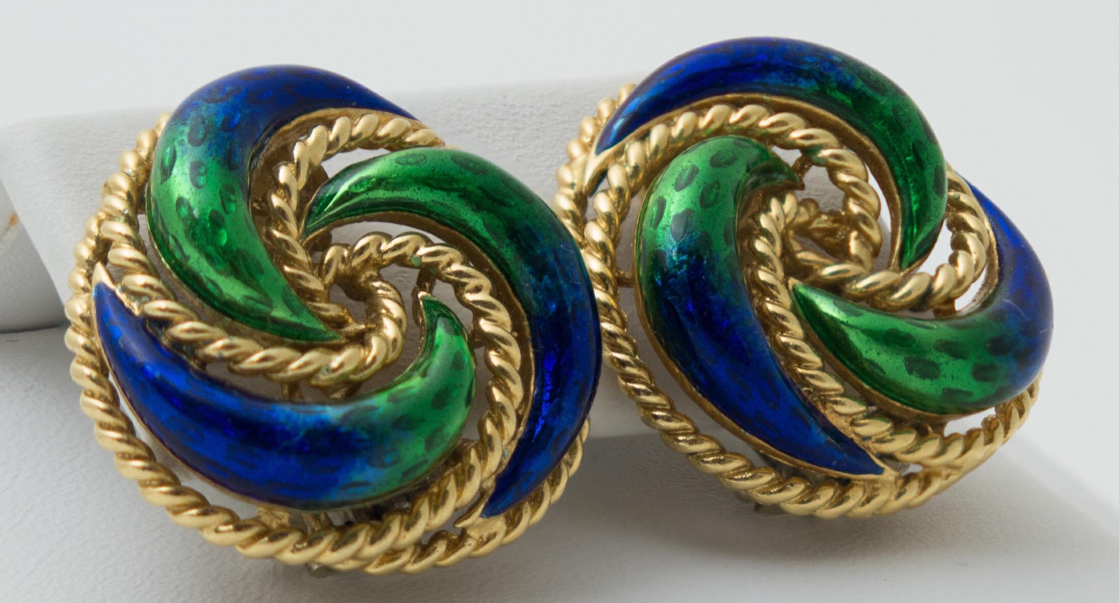 A Pair of Italian 18 karat yellow gold rope twist earclips. Decorated with beautiful vibrant blue and green transitional enamel. Marked 