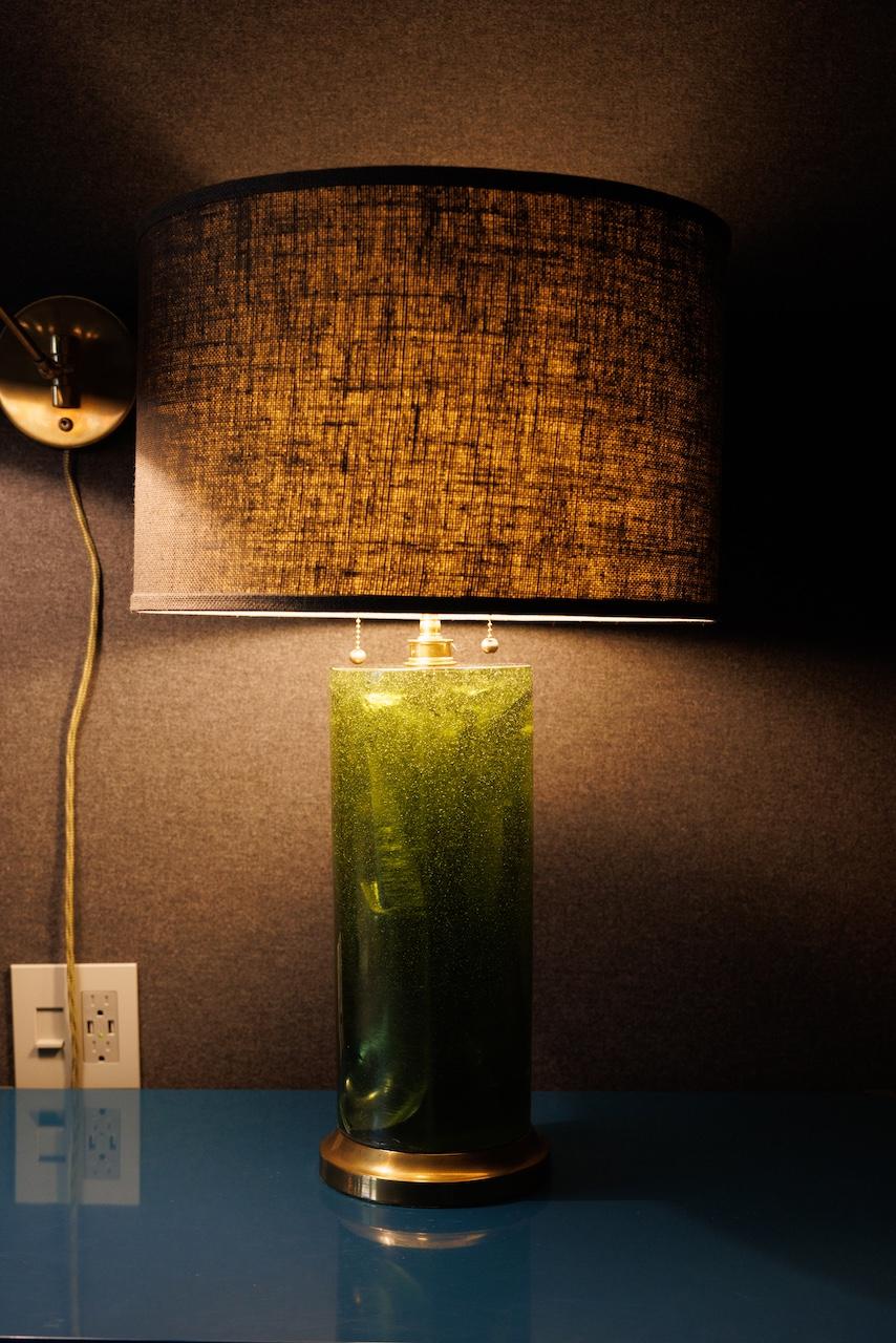 These luscious two fractal resin table lamps were designed by Marie-Claude de Fouquieres for French lighting company Ombre et Lumiere. Each features a green crushed ice resin design that melts into a brass base, topped by an elegantly soft