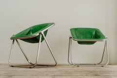 pair of green leather folding Plona chairs