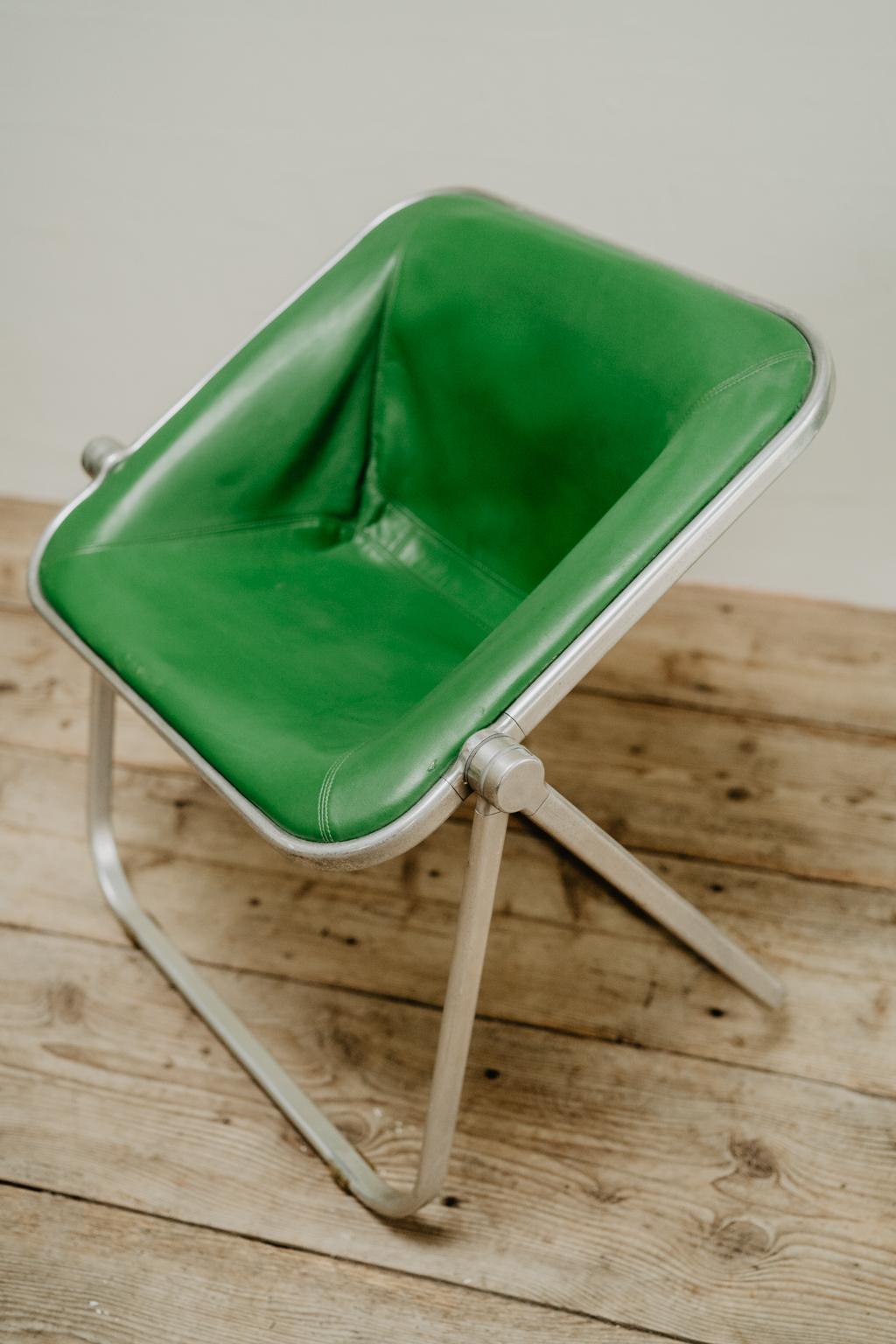 Italian pair of green leather folding Plona chairs