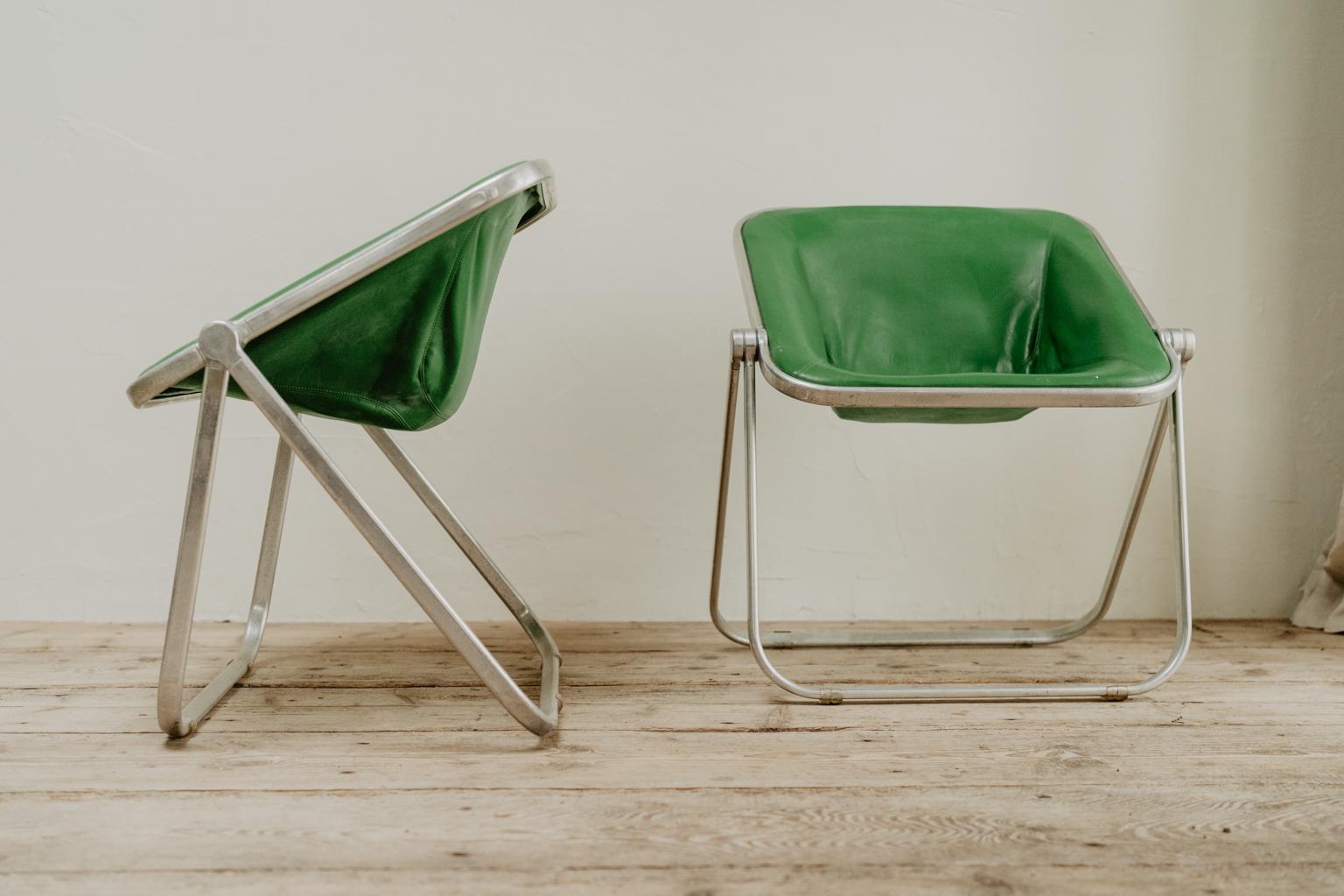 20th Century pair of green leather folding Plona chairs