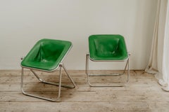 pair of green leather folding Plona chairs