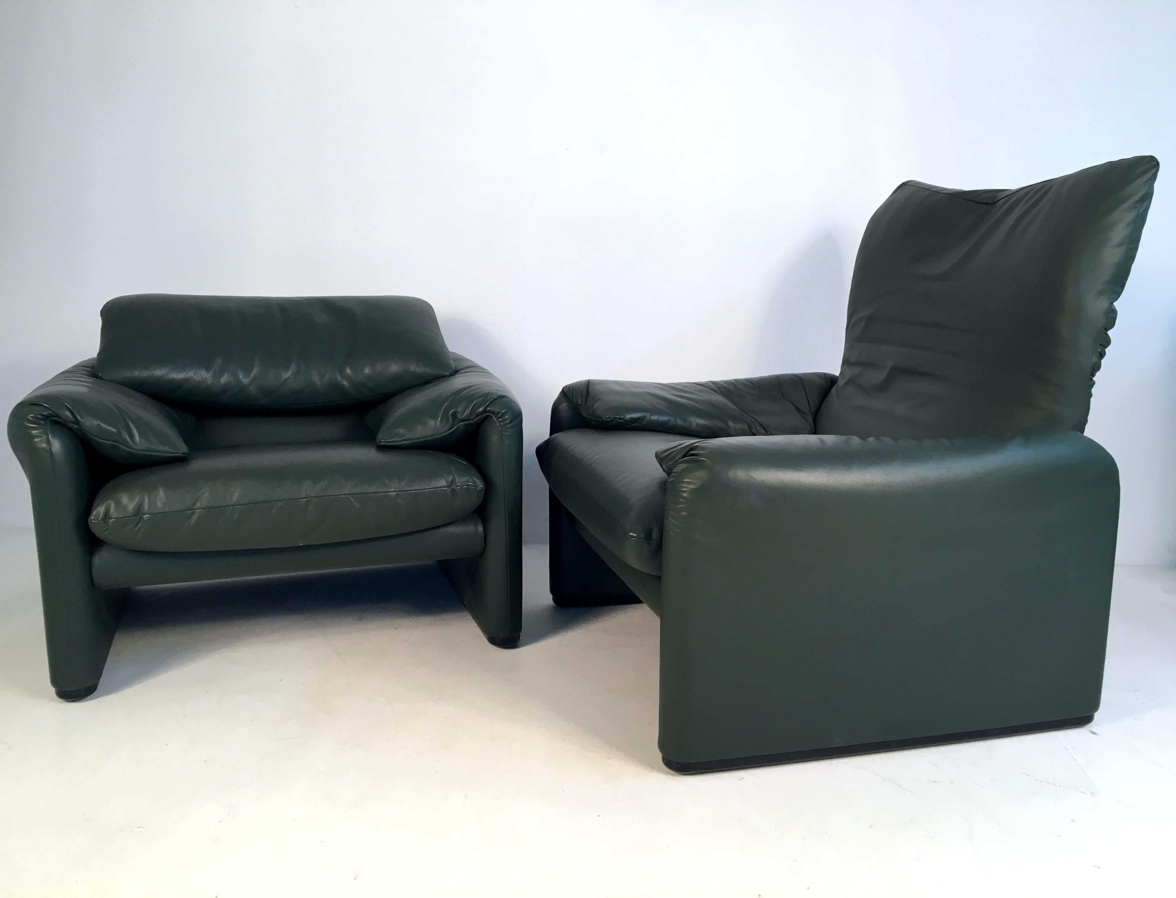 A pair of dark, bottle green, leather Maralunga chairs designed by Vico Magistretti for Cassina, in the 1970s.

The Maralunga chair was designed in 1973 by Vico Magistretti and stands out of other chairs as it can be converted from a stylish