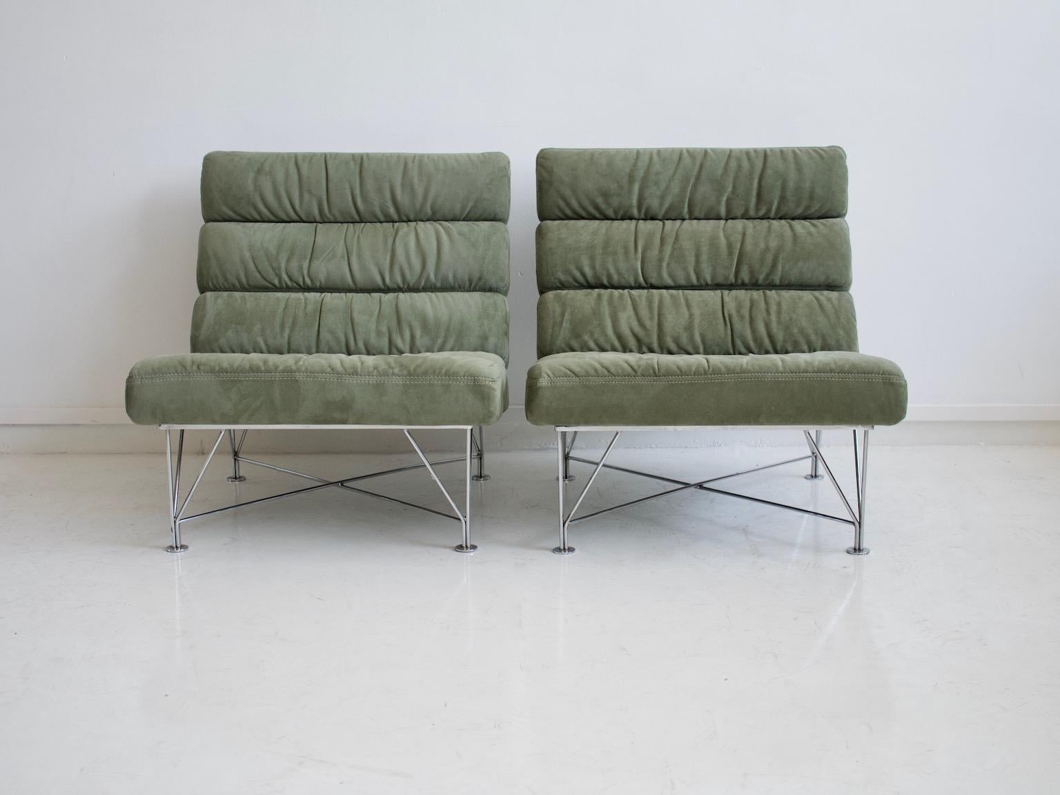 Pair of lounge chairs, model Spider, by DUX design team. Designed in 1982. Structure made of chrome-plated steel wire, covers of sage green Alcantara fabric. One chair marked with label.