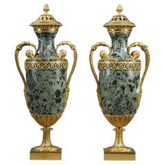 Pair of green marble baluster cassolettes, signed Victor Raulin