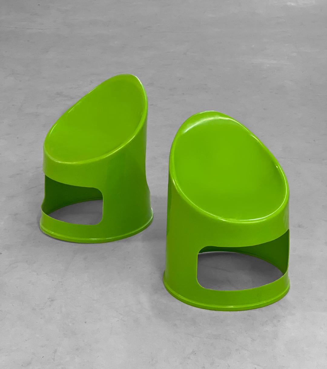 Great little pair of green 1970's molded children's chairs. Modern design that adds a nice pop of color to the space. In excellent condition.