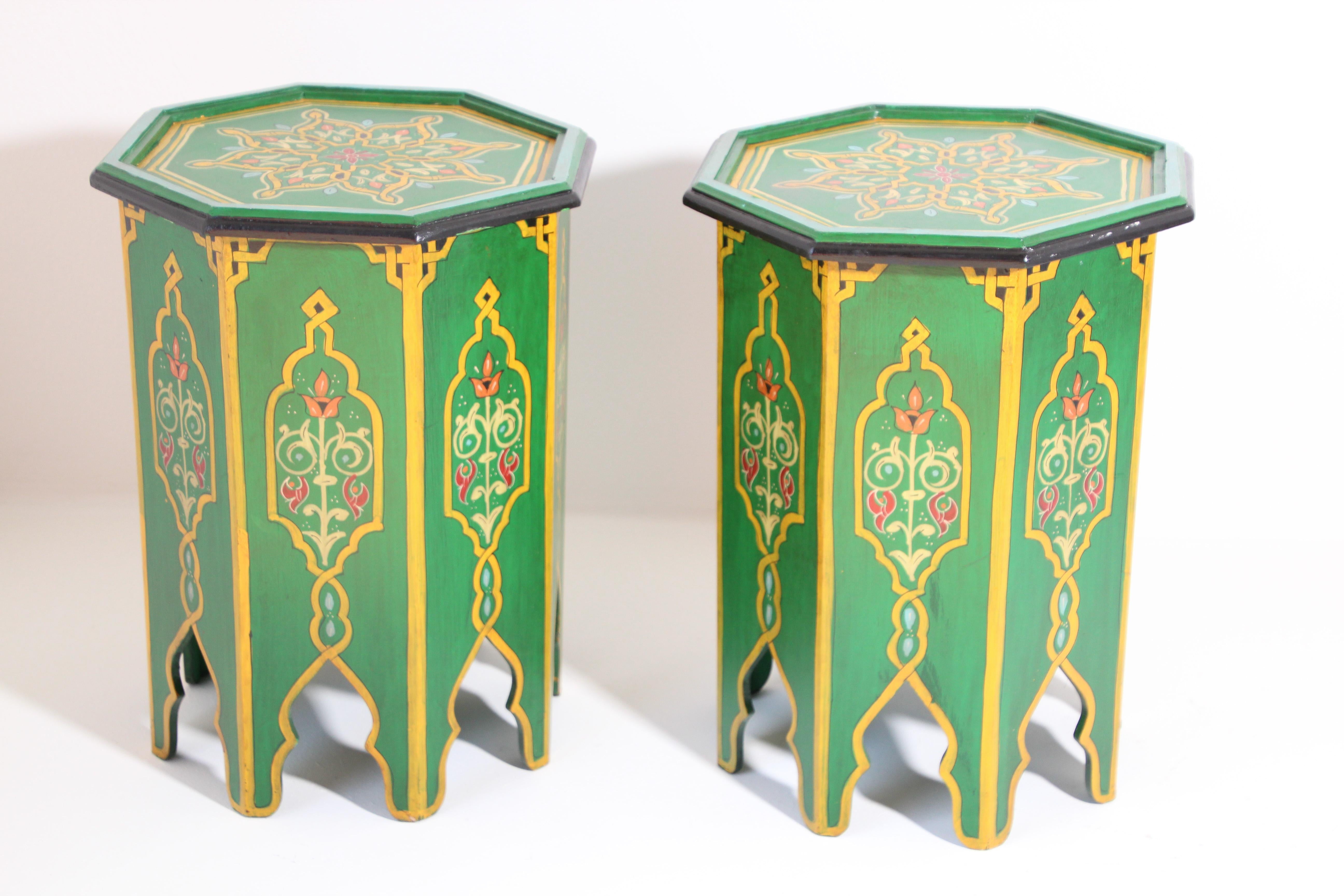 Pair of Moroccan handcrafted green hand painted tabourets or side tables.
Octagonal shape pedestal tables with Moorish arches.
Very decorative fine artwork in octagonal shape base.
You can use them as nightstand, stools, or side pedestal table.
This