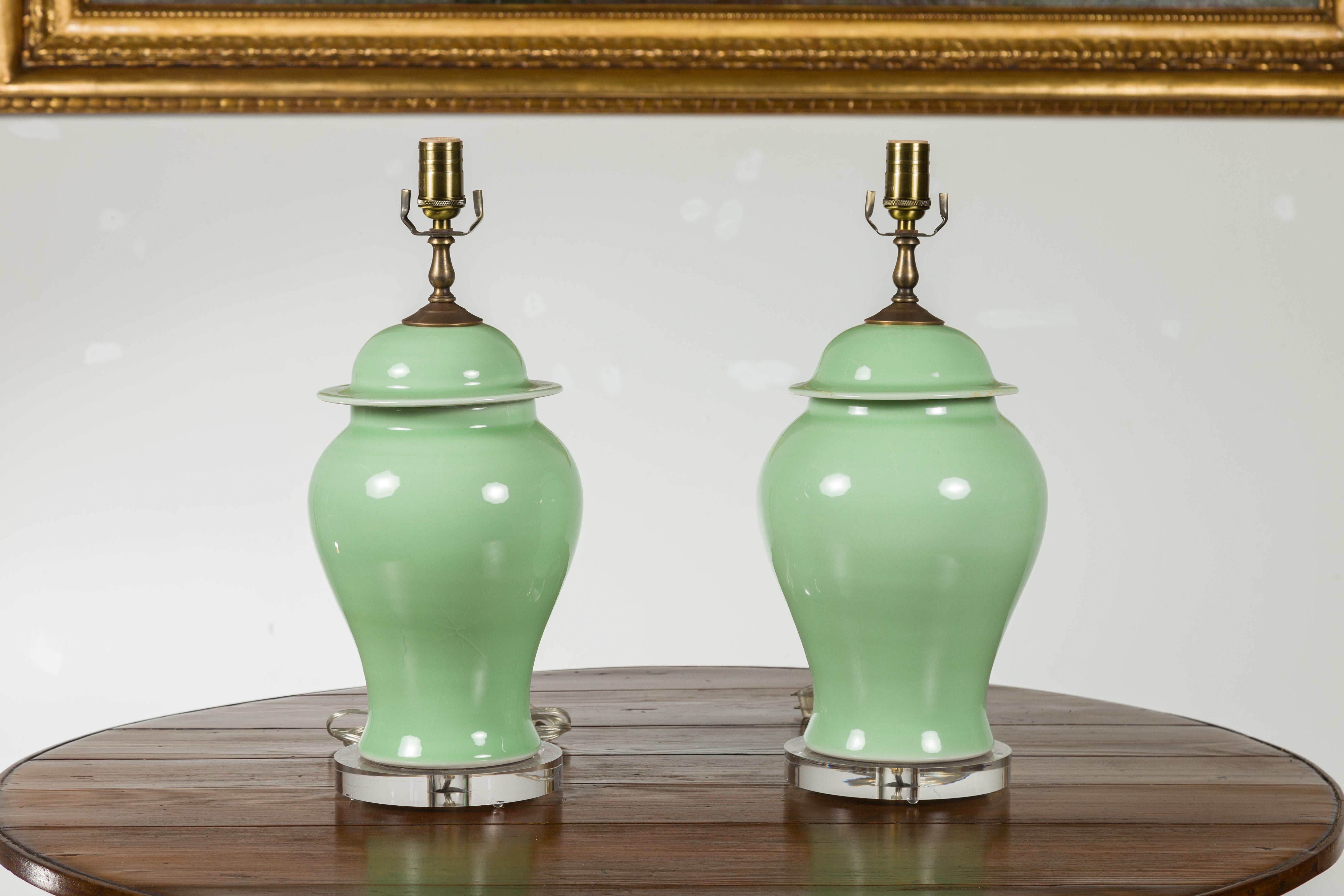 Pair of Green Porcelain Lidded Jar Table Lamps with Round Lucite Bases, Wired For Sale 6
