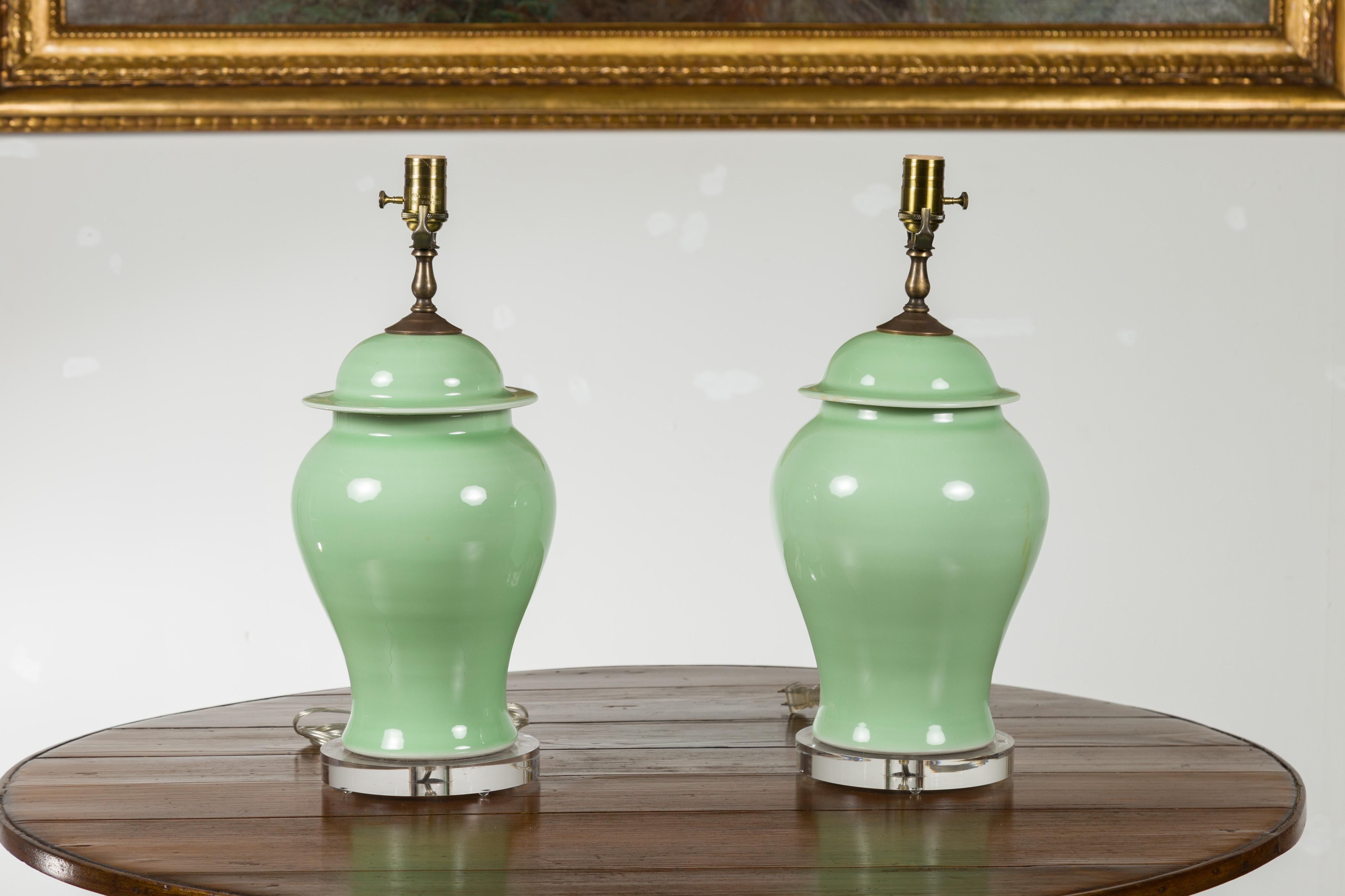 Pair of Green Porcelain Lidded Jar Table Lamps with Round Lucite Bases, Wired For Sale 7