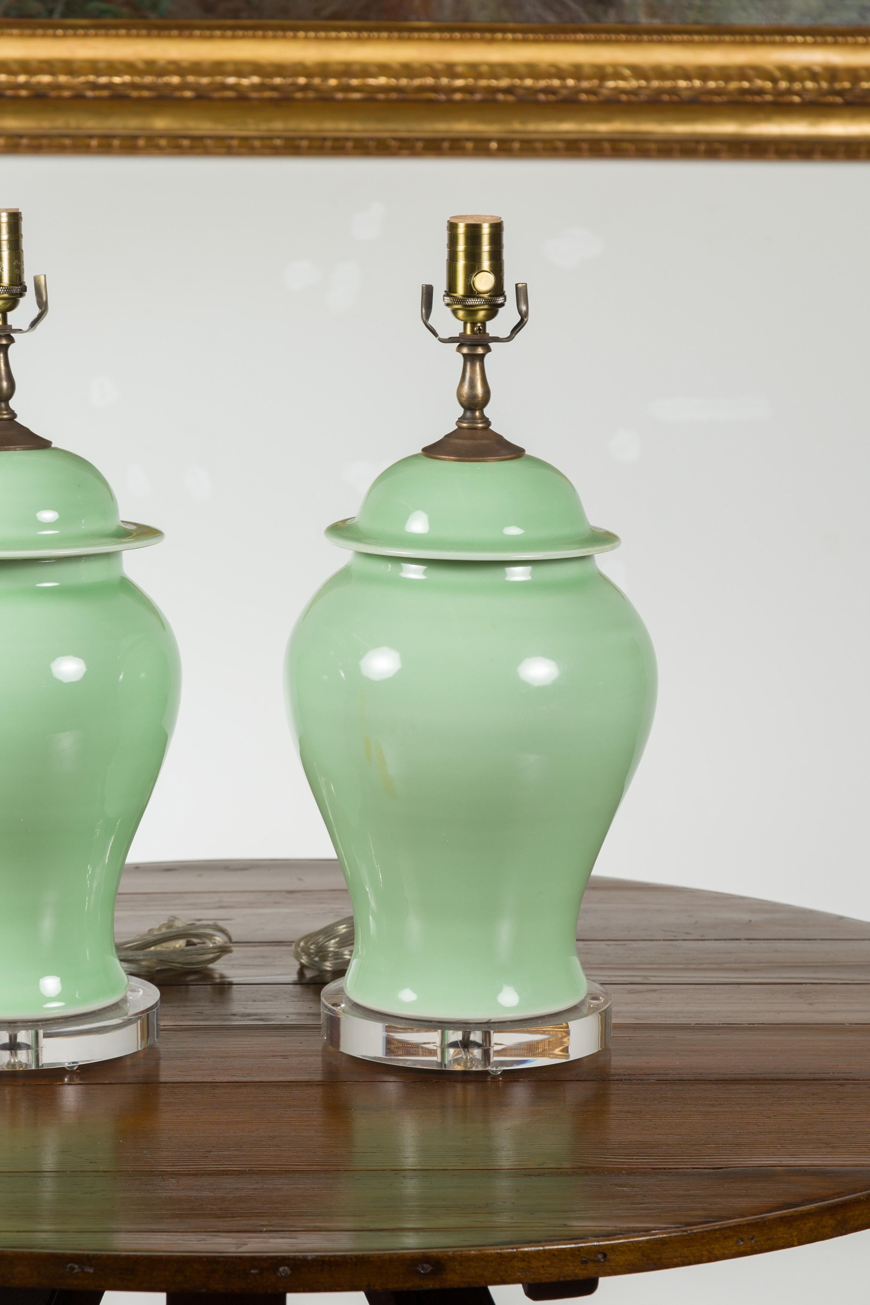 Pair of Green Porcelain Lidded Jar Table Lamps with Round Lucite Bases, Wired 2