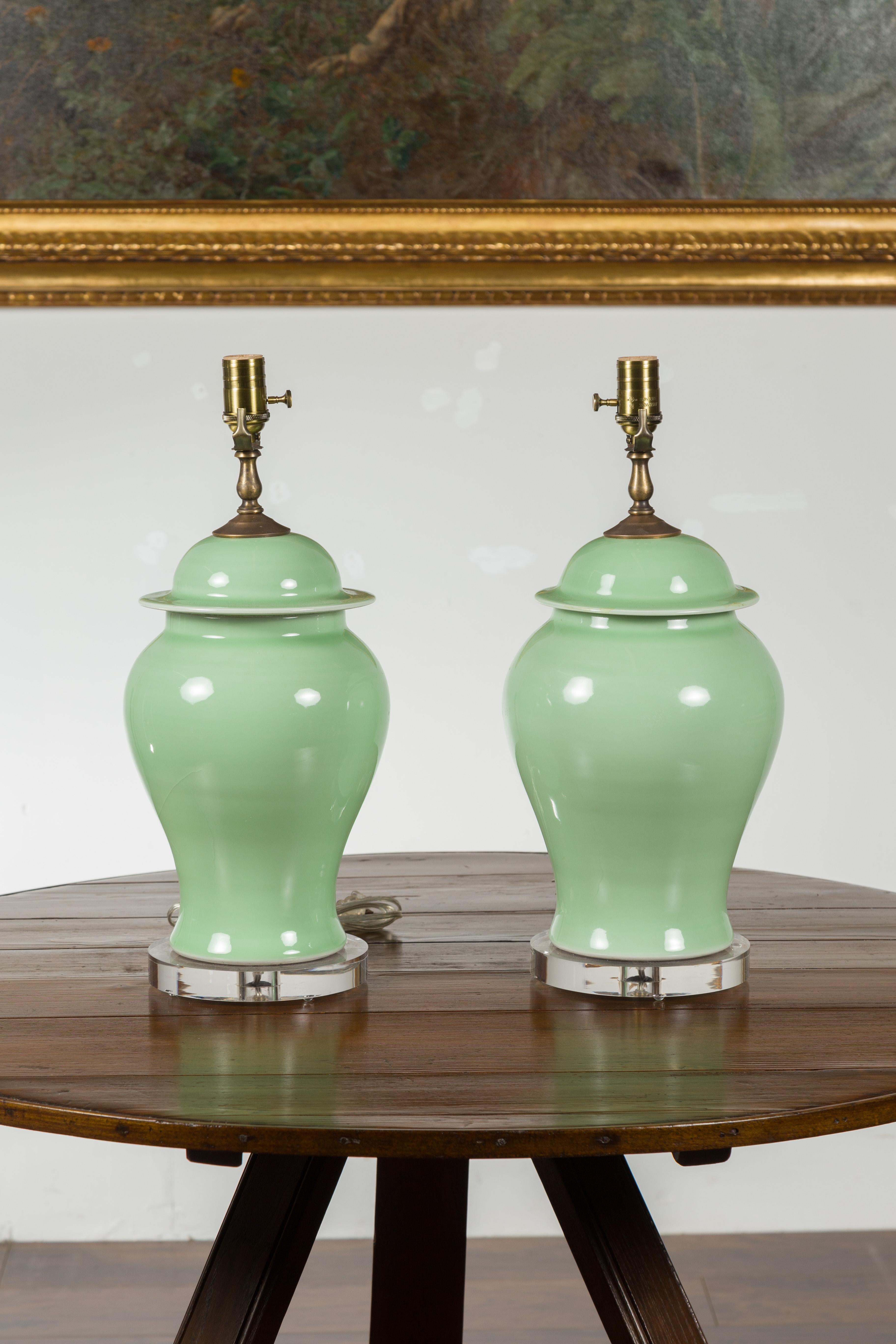 Pair of Green Porcelain Lidded Jar Table Lamps with Round Lucite Bases, Wired For Sale 5