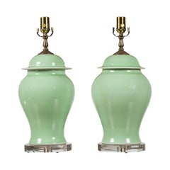 Pair of Green Porcelain Lidded Jar Table Lamps with Round Lucite Bases, Wired