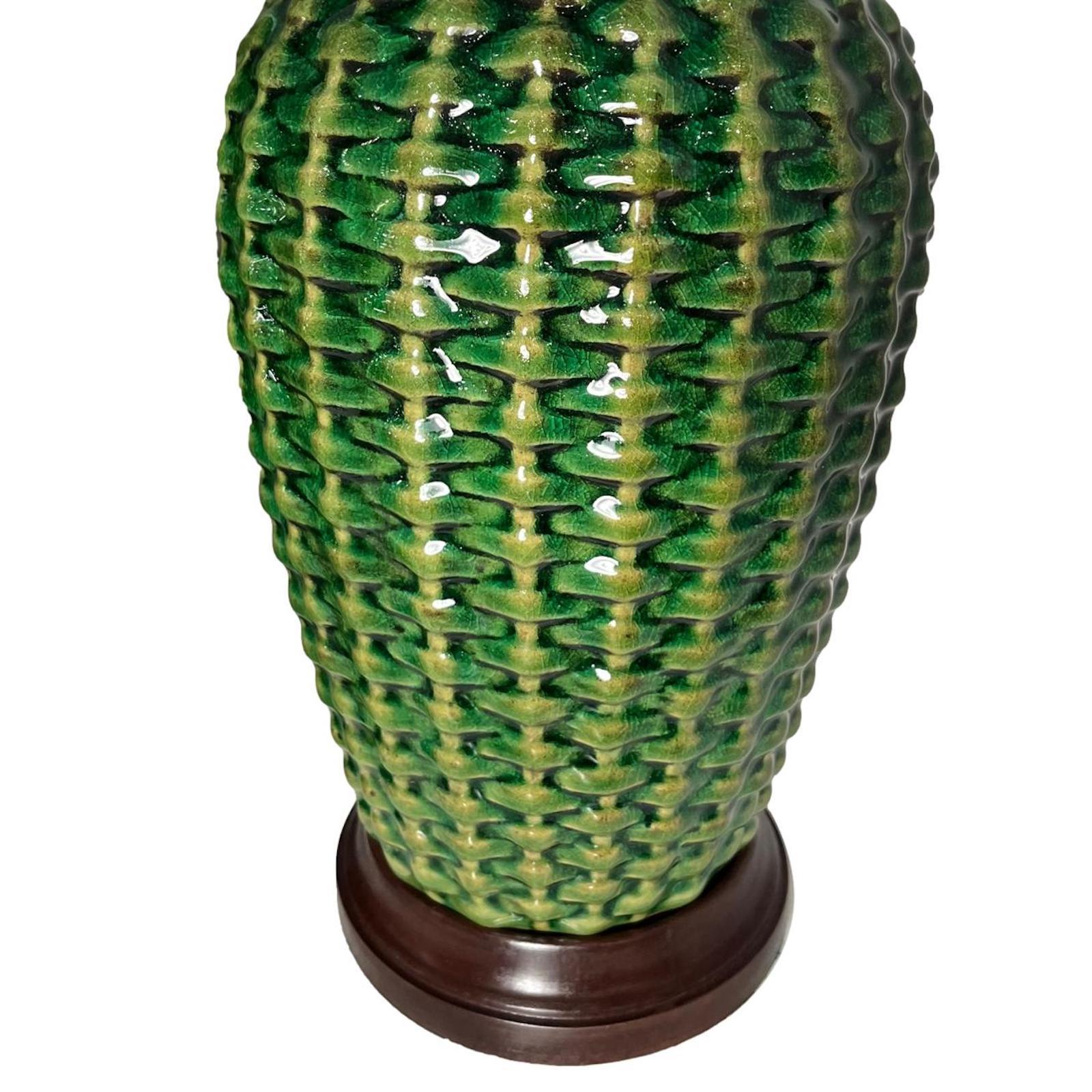 Pair of circa 1950s Italian porcelain lamps in a woven pattern.

Measurements:
Height of body: 19