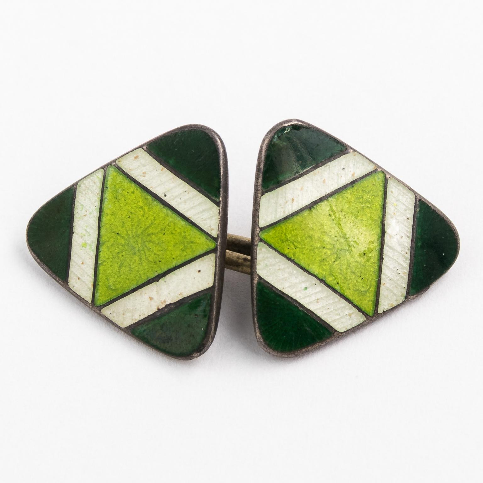 Circa 20th century pair of Green enamel painted cufflinks in Sterling Silver with matching box.
