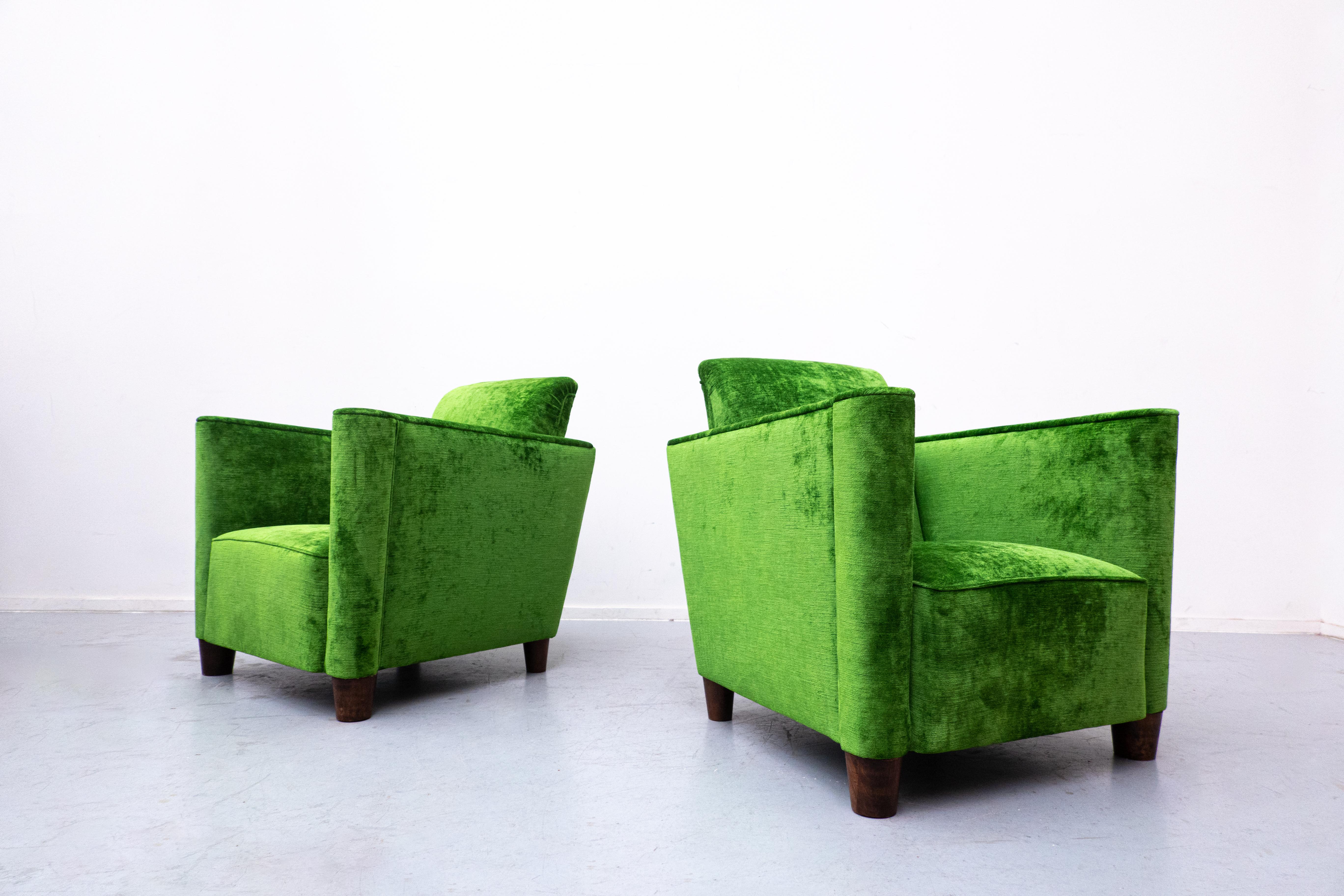Pair of green velvet club armchairs, 1940s.