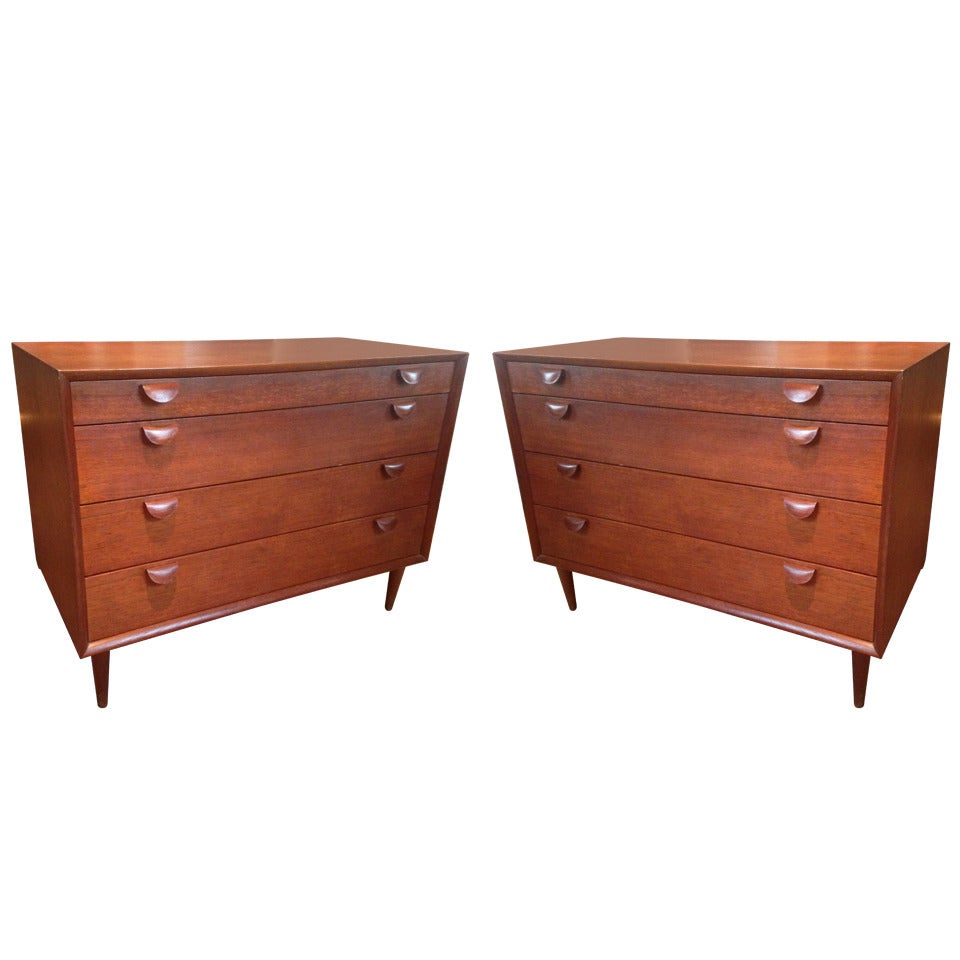 Handsome pair of four-drawer teak dressers with curved teak-veneer plywood pulls. With 