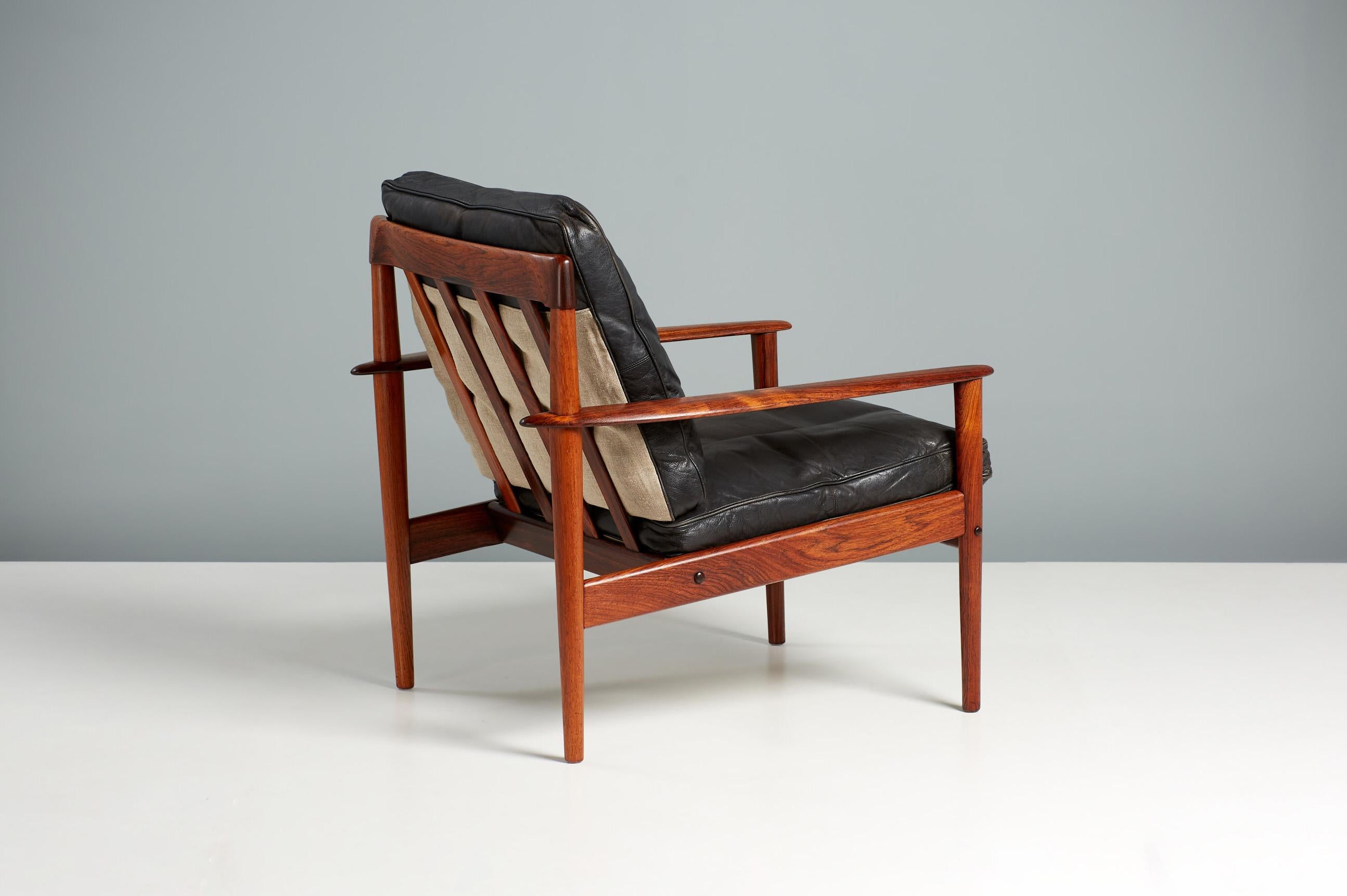 Grete Jalk Model PJ-56 Lounge chairs

A beautiful pair of lounge chairs designed by Grete Jalk for cabinetmaker Poul Jeppesen in Denmark, circa 1956. These examples come in stunning rosewood that has been refinished in Danish oil at our workshops