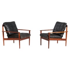 Pair of Grete Jalk PJ-56 Rosewood Lounge Chairs 1950s