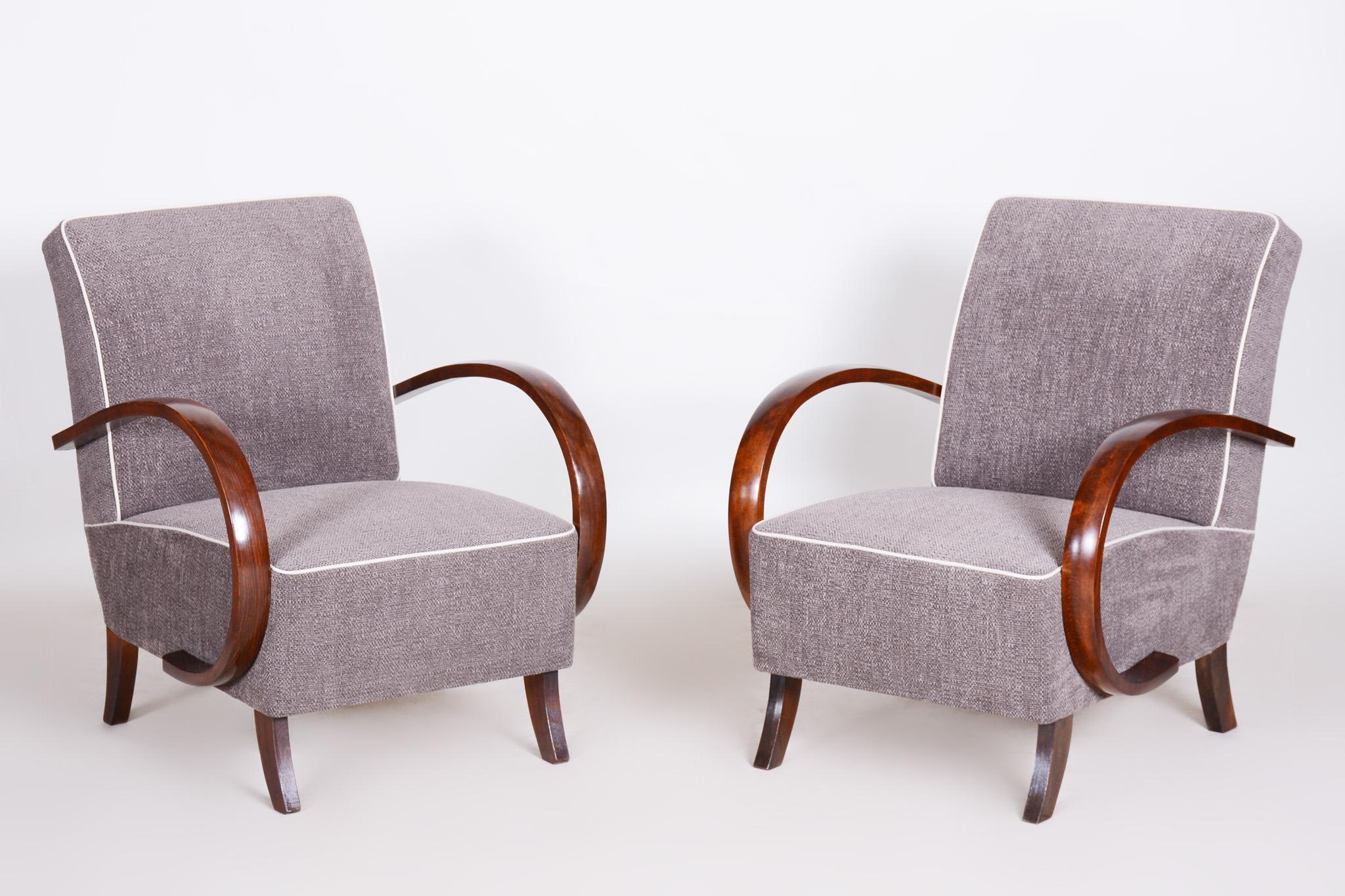 Art Deco armchairs made out of beech, fully restored by our team.