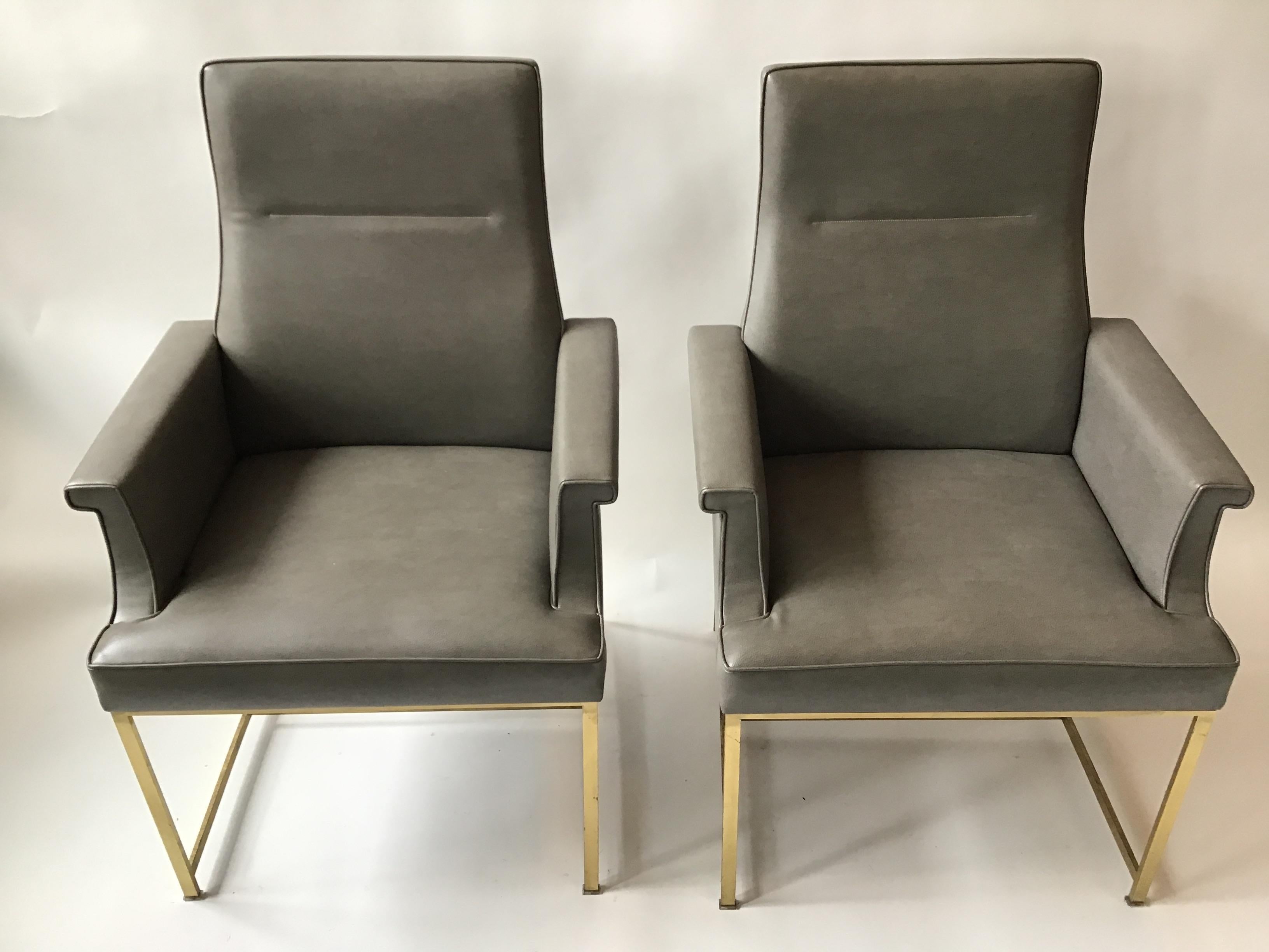 Pair of Grey Leather Armchairs on Brass Bases In Good Condition In Tarrytown, NY
