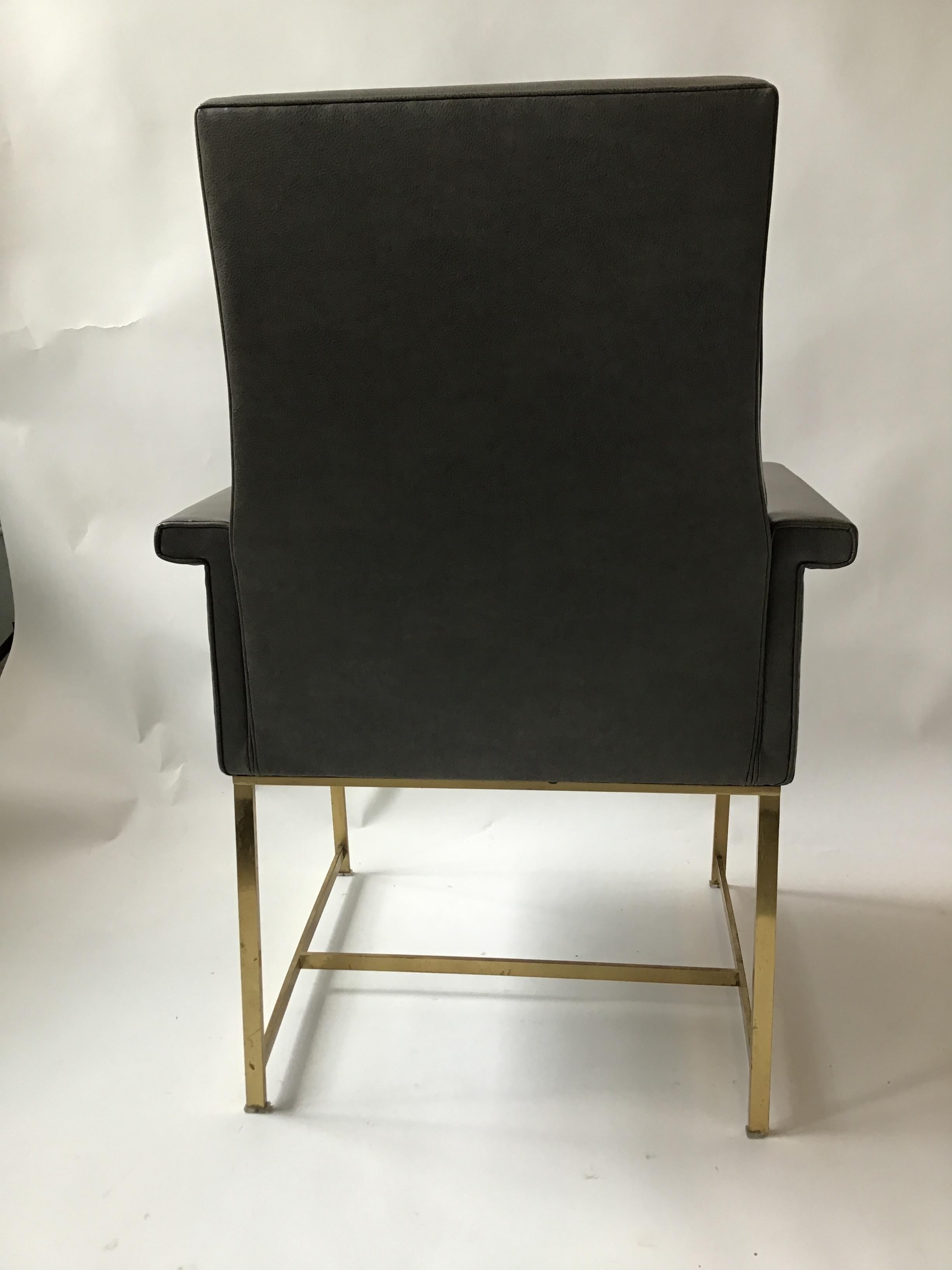 Pair of Grey Leather Armchairs on Brass Bases 3