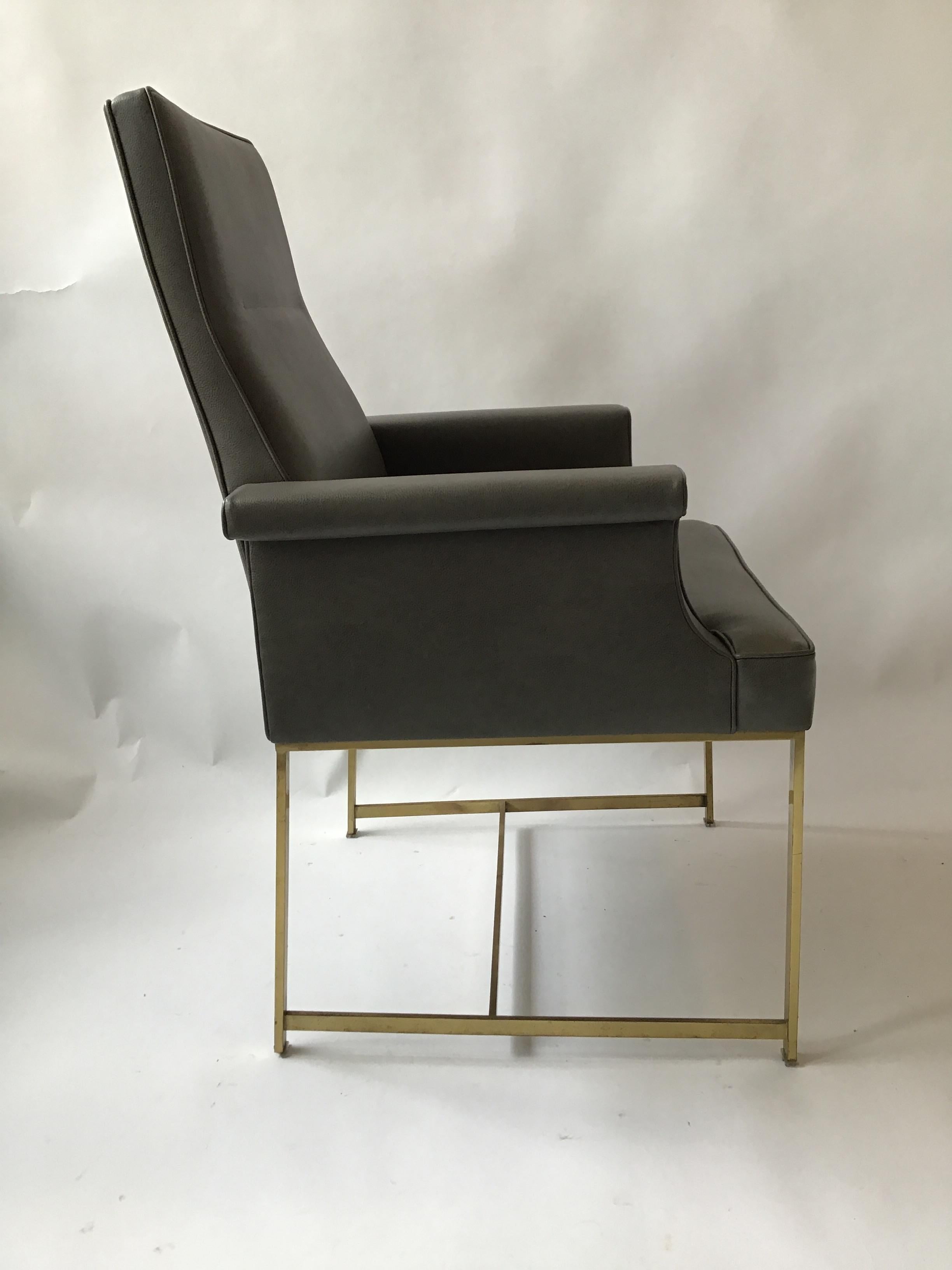 Pair of Grey Leather Armchairs on Brass Bases 4
