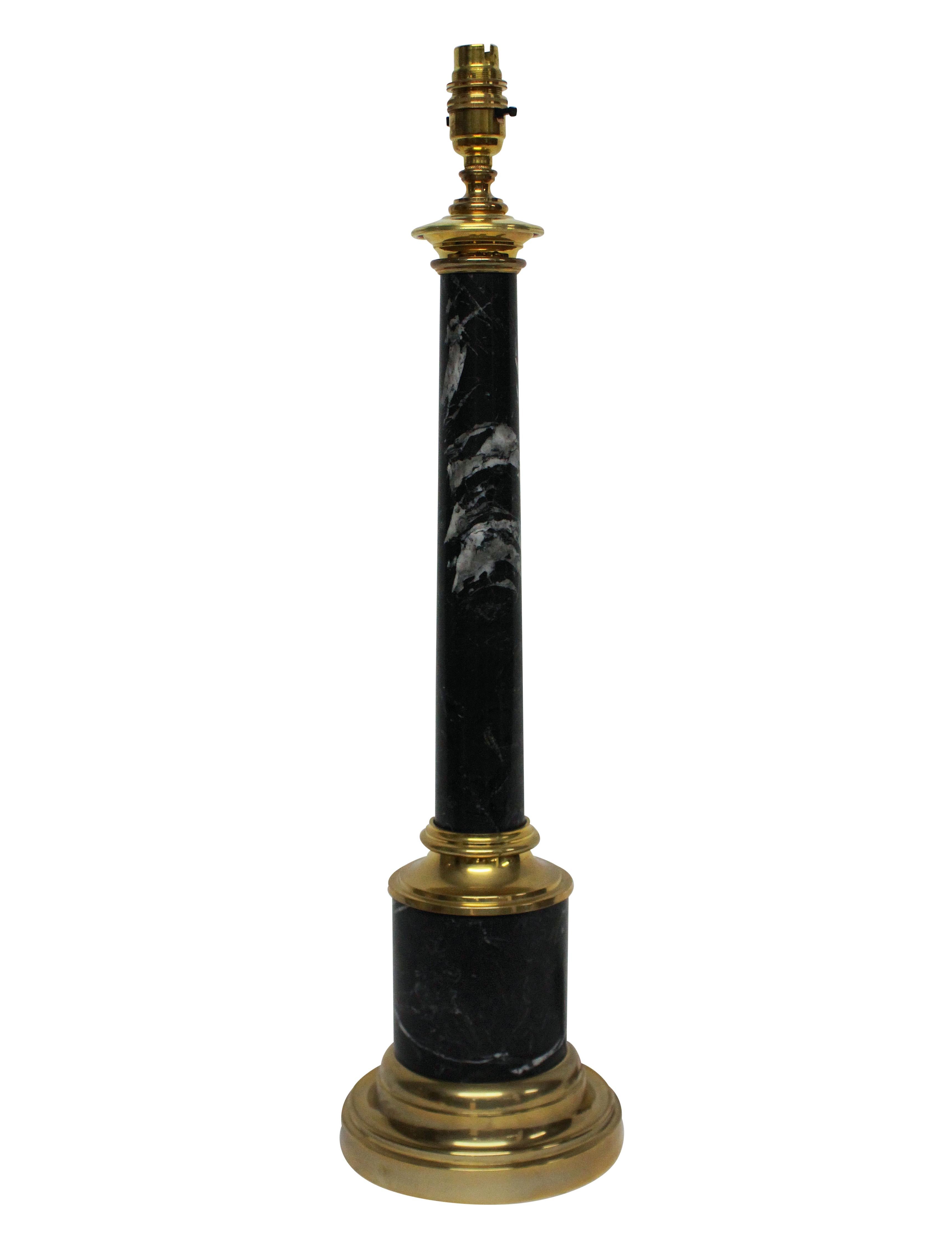 A pair of Italian column lamps in grey Tuscan marble, with gold-plated metal work.