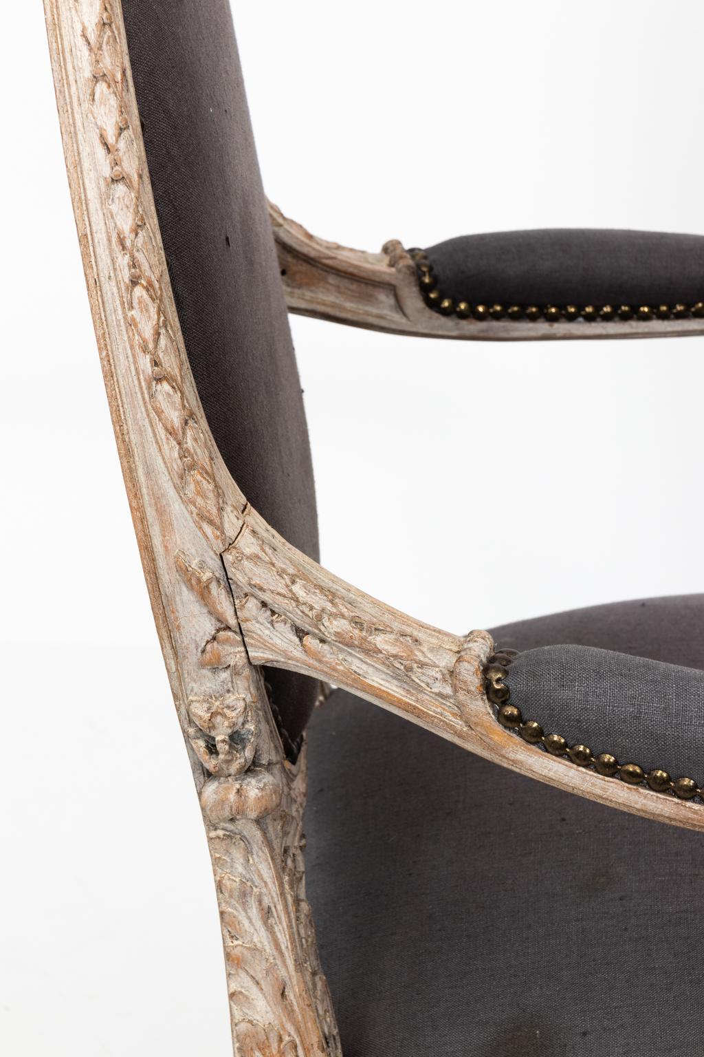 Painted Pair of Grey Upholstered Louis XVI Style Armchairs, circa 1820