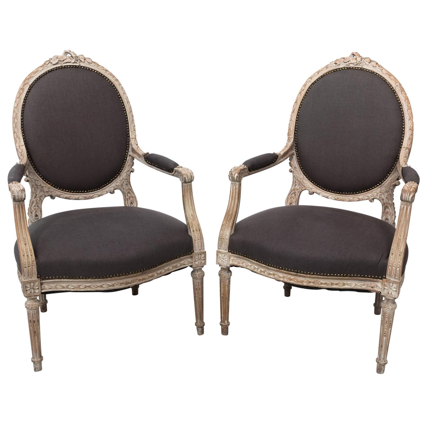 Pair of Grey Upholstered Louis XVI Style Armchairs, circa 1820