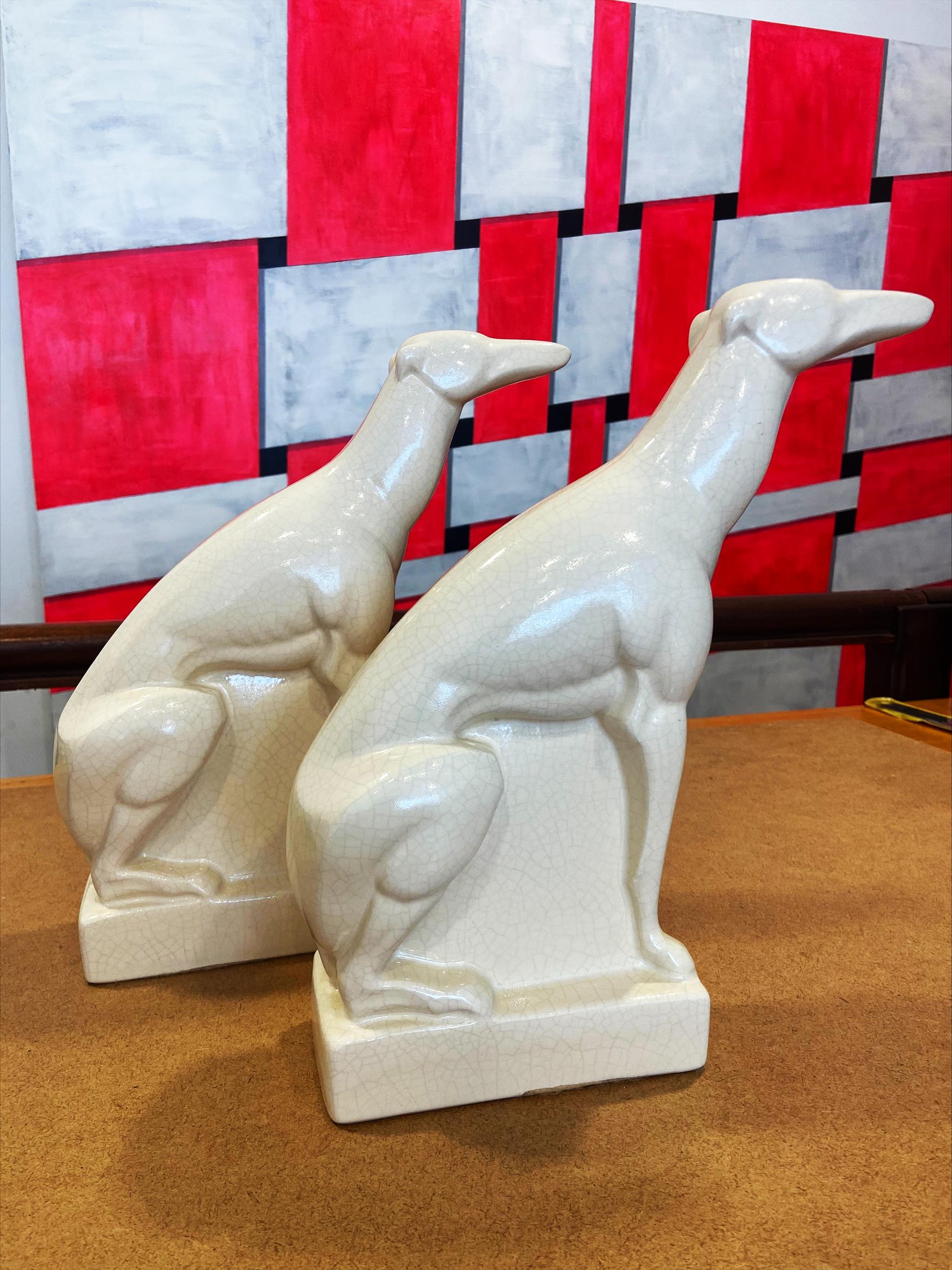 Pair of greyhounds - Charles Lemanceau 
For the Saint Clément factory
Cracked ceramics
H30xW21xD8cm
1925
Perfect condition.