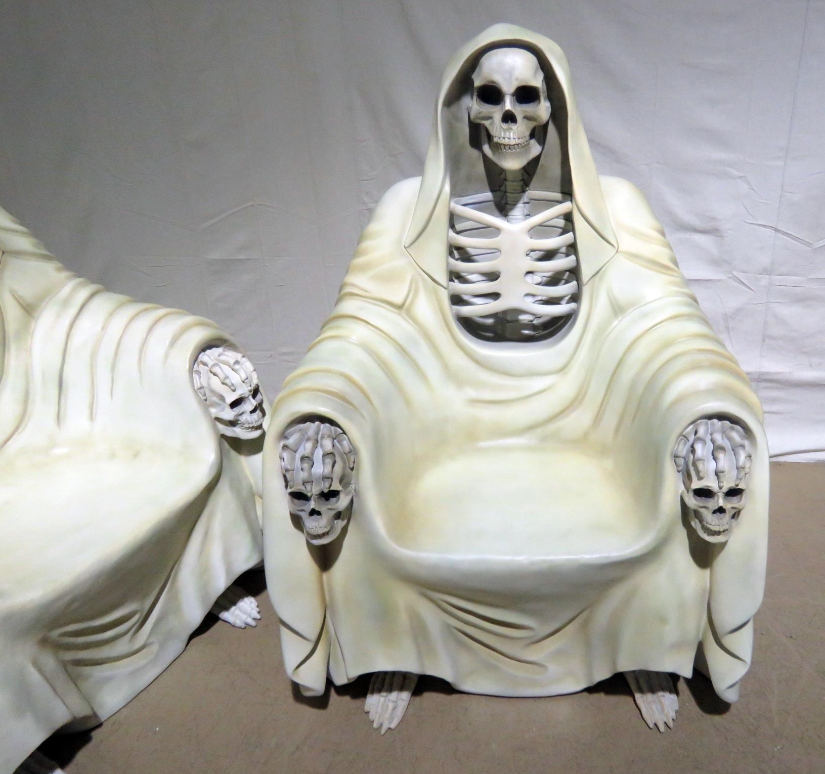 Pair of Grim Reaper style figural sketelal armchairs.