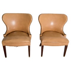 Pair of Grosfeld House Beige Faux Leather Club Chairs