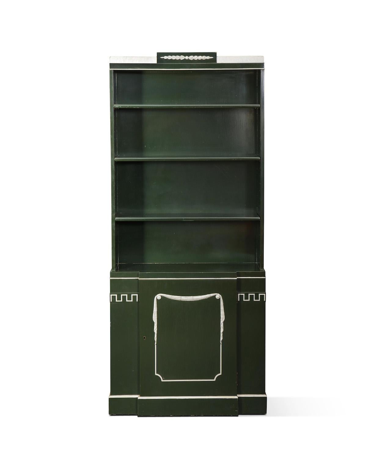 Pair of Grosfeld House bookcases in Forrest green lacquer with silver detailing. Interior shelving at bottom section.