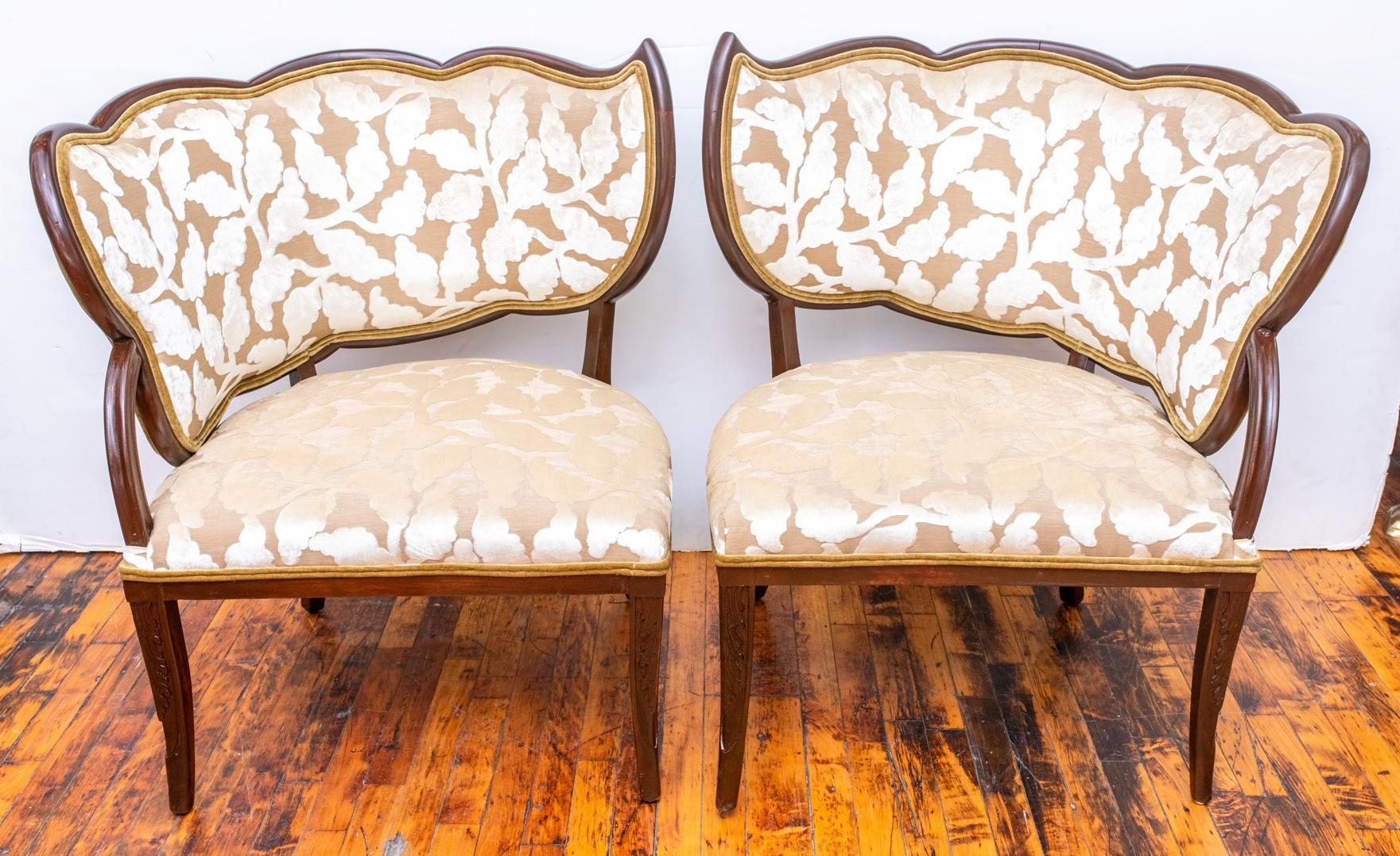 Pair of Grosfeld House mahogany framed leaf chairs, recently upholstered in a champagne cut velvet with a leaf pattern and contrasting velvet on back. Made in the USA in the 1940s.