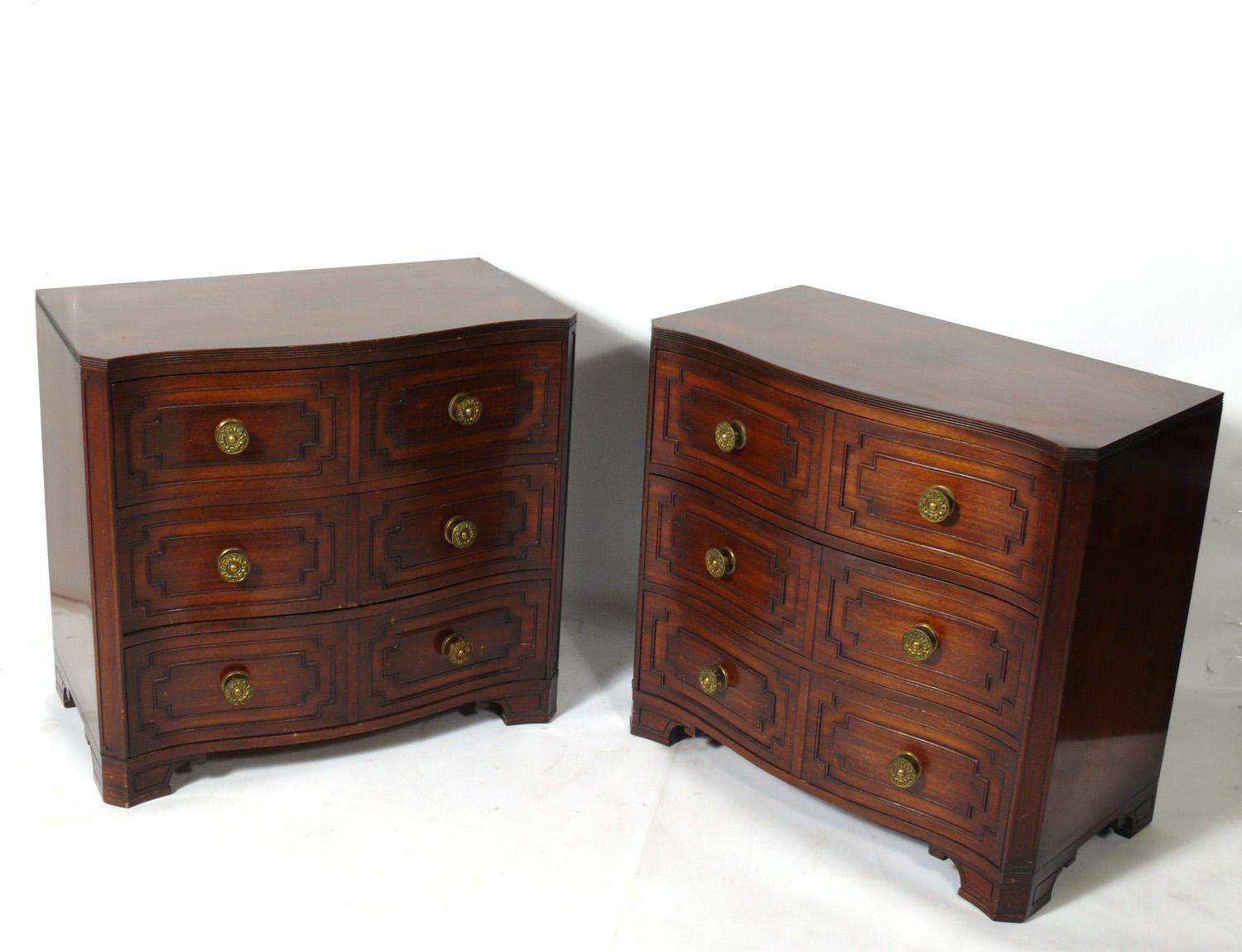 Pair of glamorous serpentine chests, designed by Grosfeld House, circa 1940s. These chests are currently being refinished and can be completed in your choice of color. Choose any stain color, or really bump up the glamour factor with a lacquered