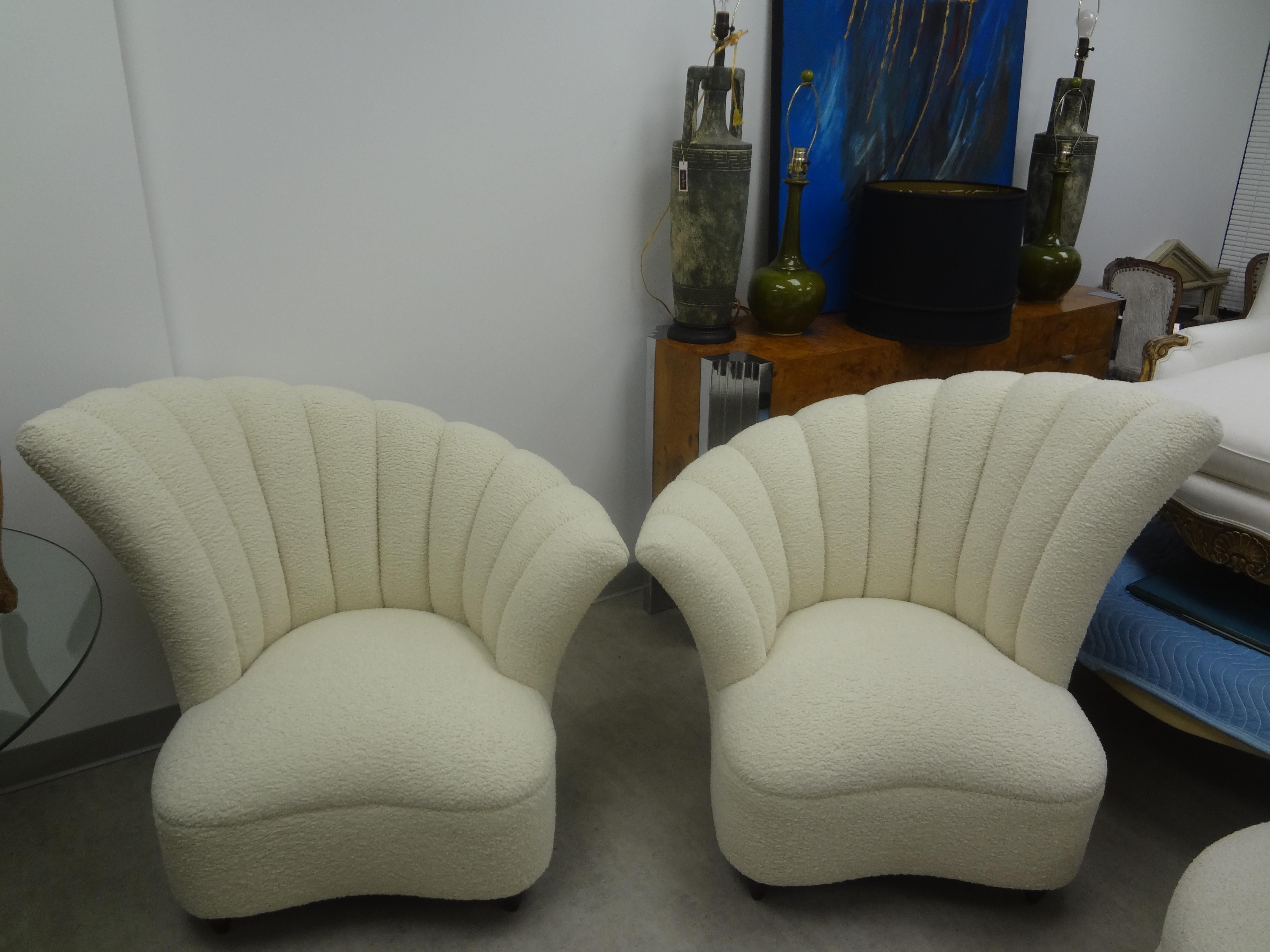 Pair of Grosfeld House asymmetrical channel back lounge chairs This stunning pair of Hollywood Regency Billy Haines style lounge chairs are a true opposing pair. This large pair of Art Deco style fan back chairs have been professionally upholstered