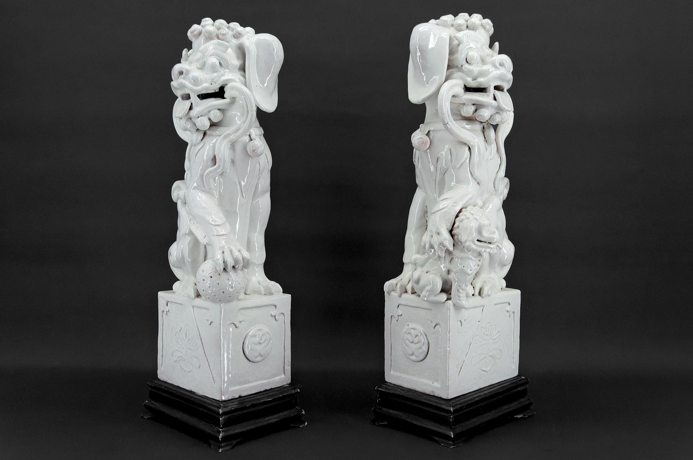 Enameled Pair of Guardian Lions / Fo Dogs / Shizi, White Ceramic, China, Qing Era, 19th  For Sale
