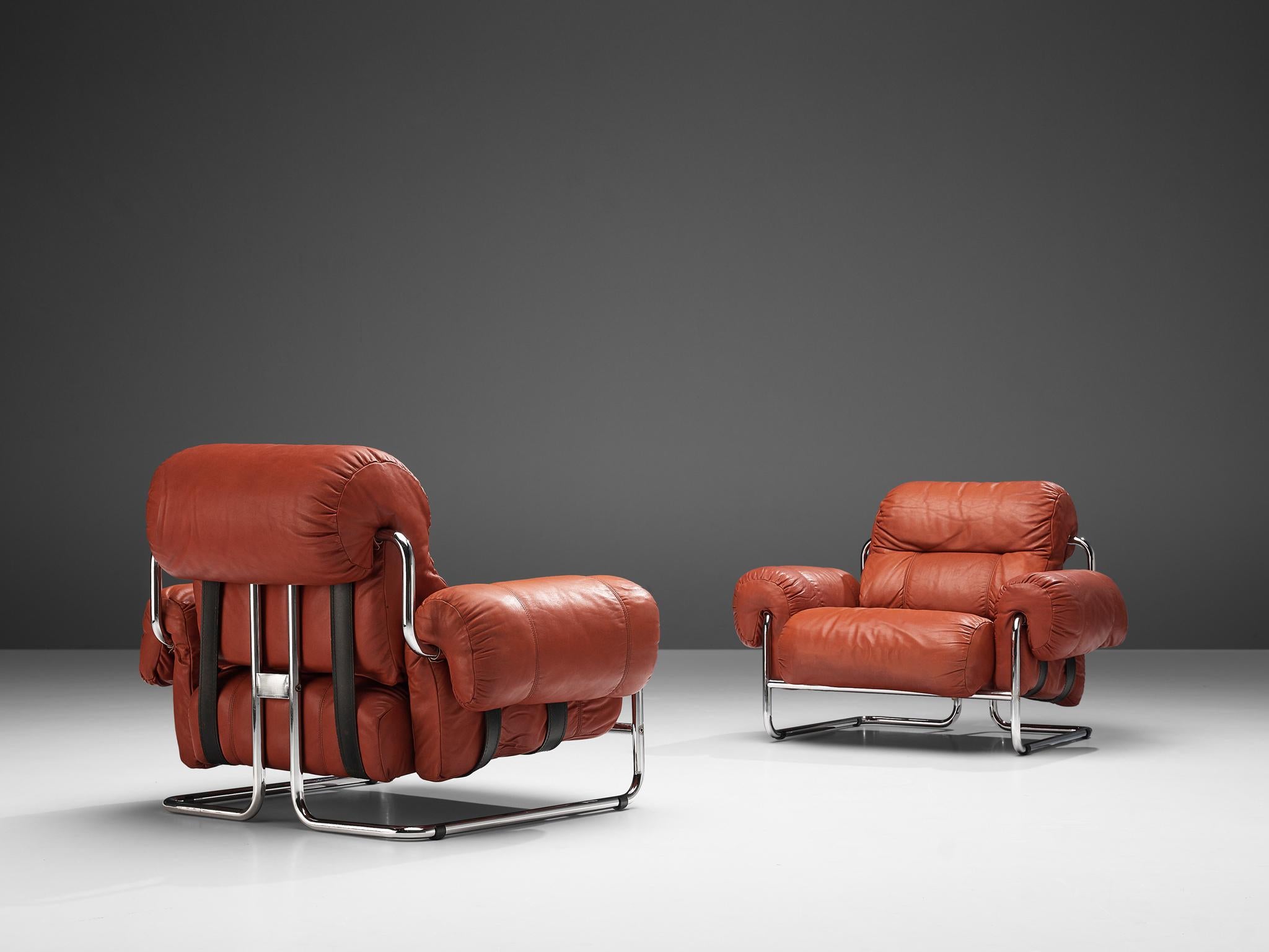 Guido Faleschini for Mariani, pair of armchairs, model 'Tucroma' red leather, chrome, Italy, 1970s

Rare pair of lounge chairs, designed by Guido Faleschini for Mariani in the early 1970s. The chairs have a tubular chrome structure as a frame with