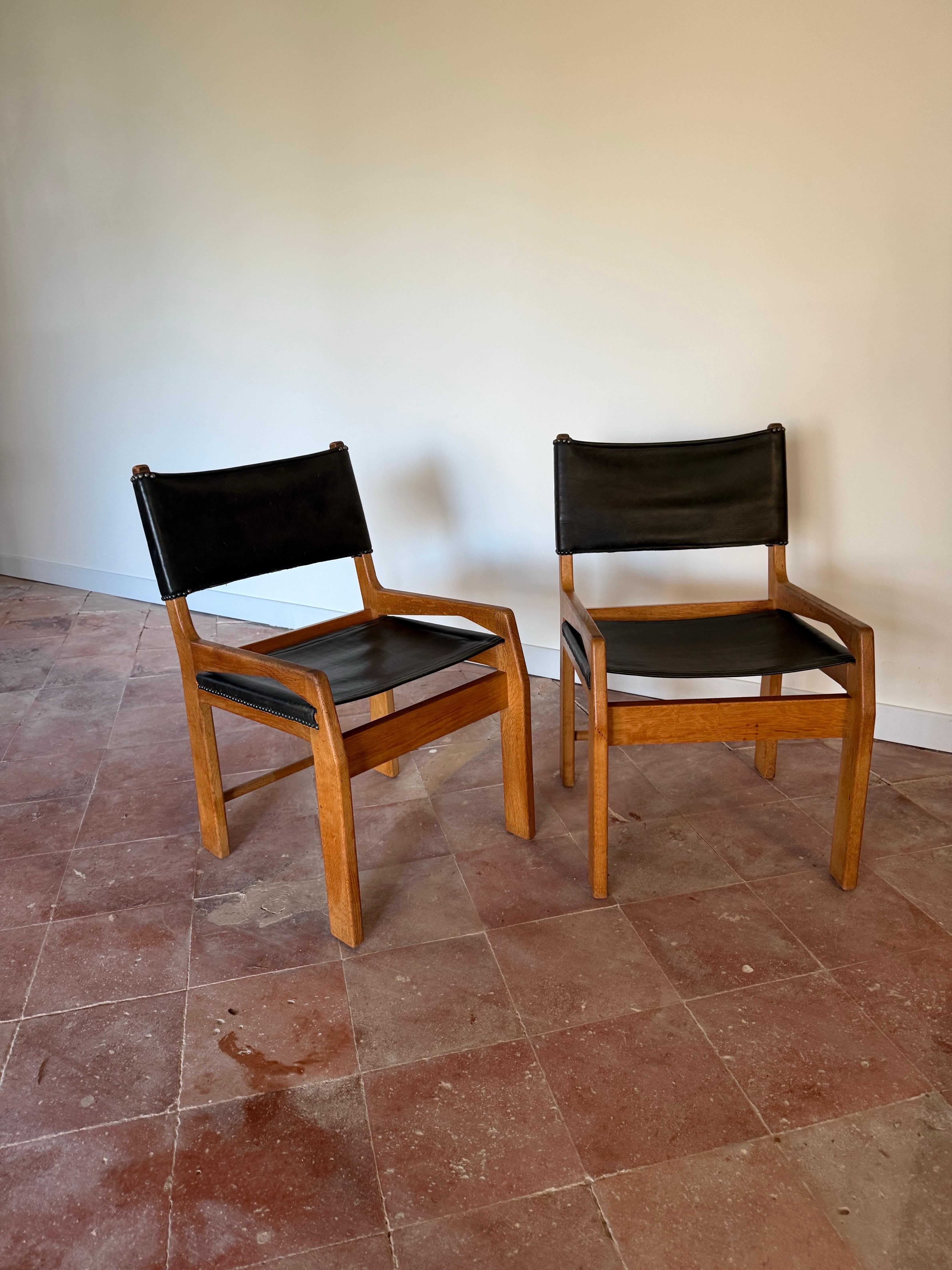 Pair of Guillerme et Chambron oak and leather chairs For Sale