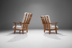 Pair of Guillerme et Chambron "repos" Lounge Chairs, France, 1950s