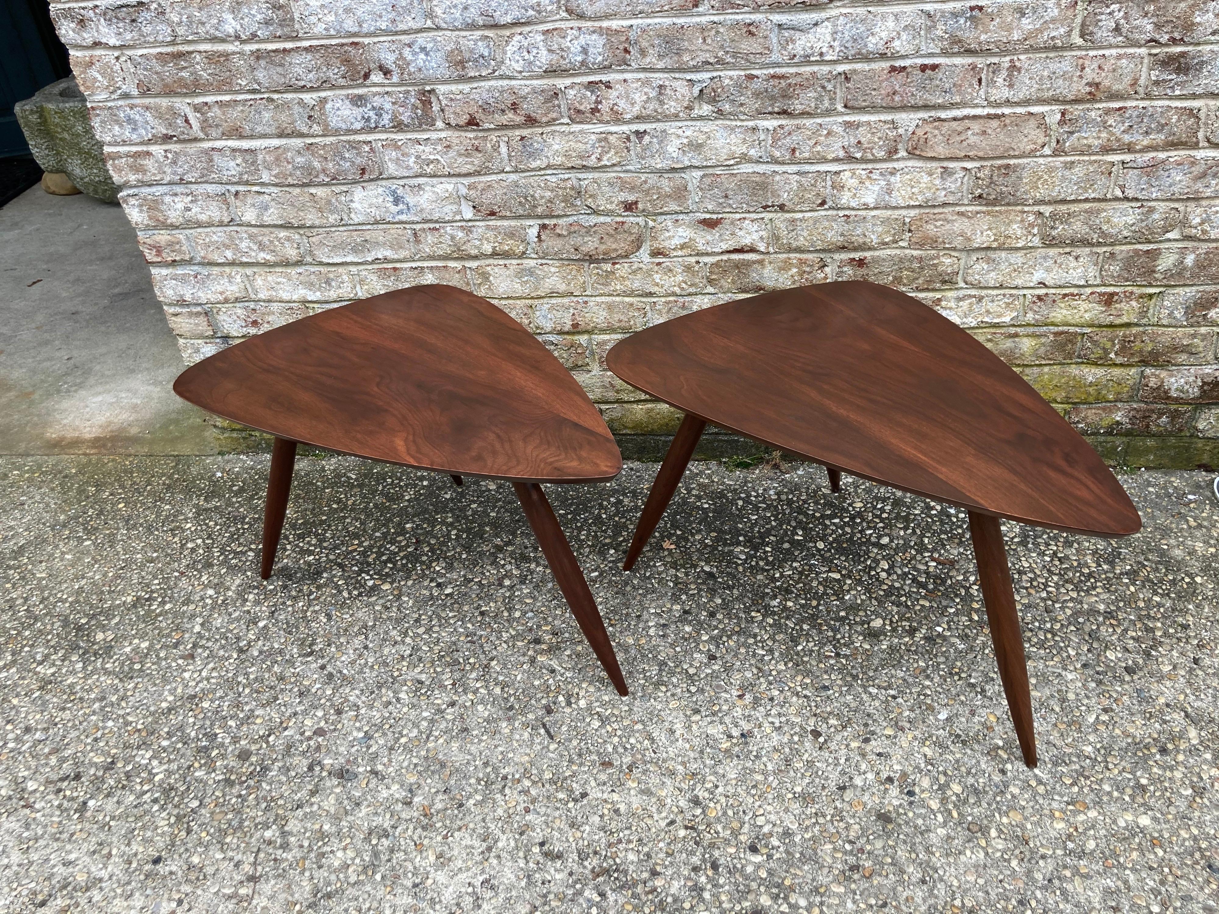 Pair of guitar pick walnut coffee / cocktail tables ... triangular form top with beveled edge and 3 elegant tapered legs .... Phillip Powell style.