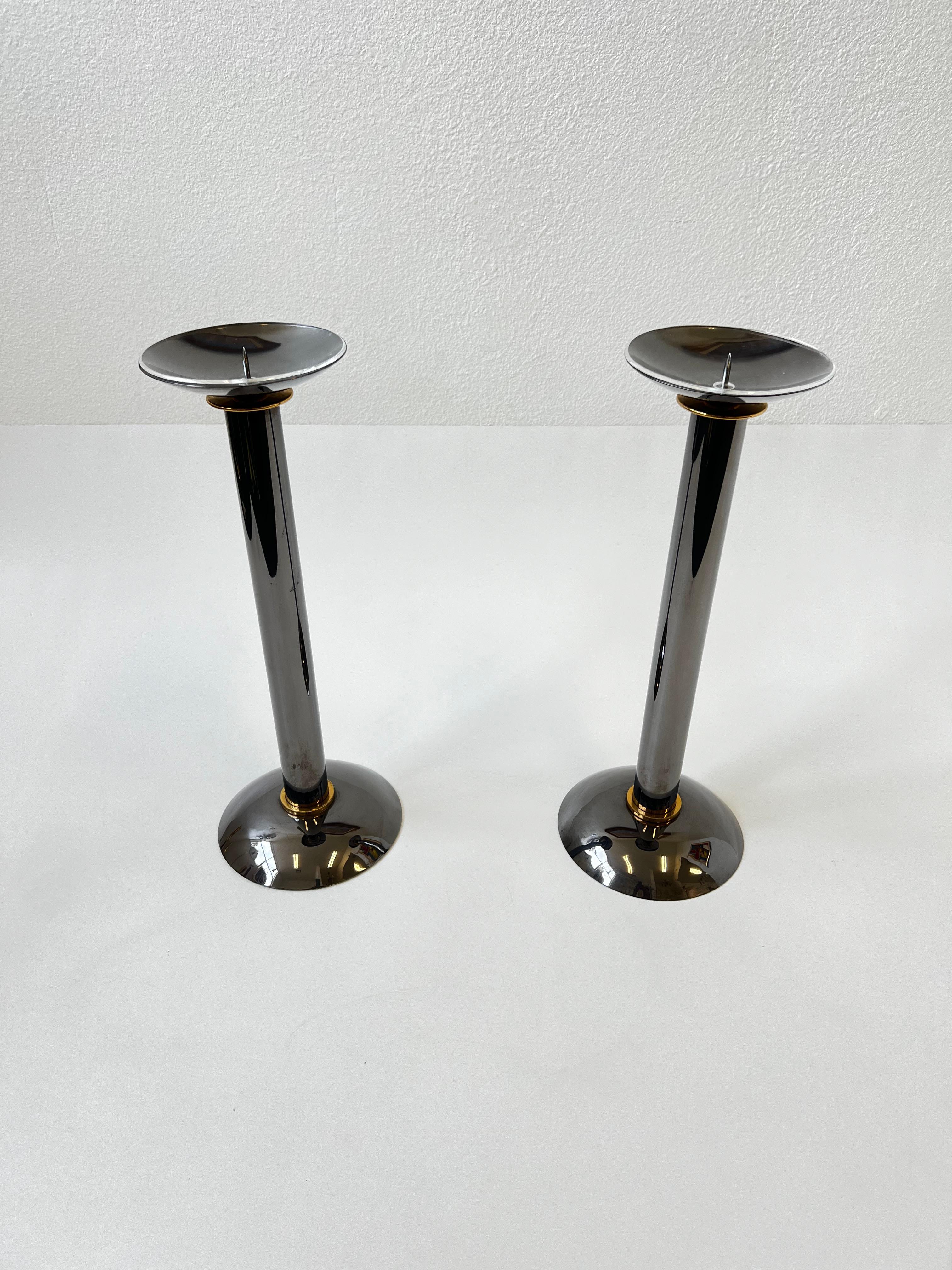 Metal Pair of Gunmetal and Brass Candle Holders by Karl Springer  For Sale